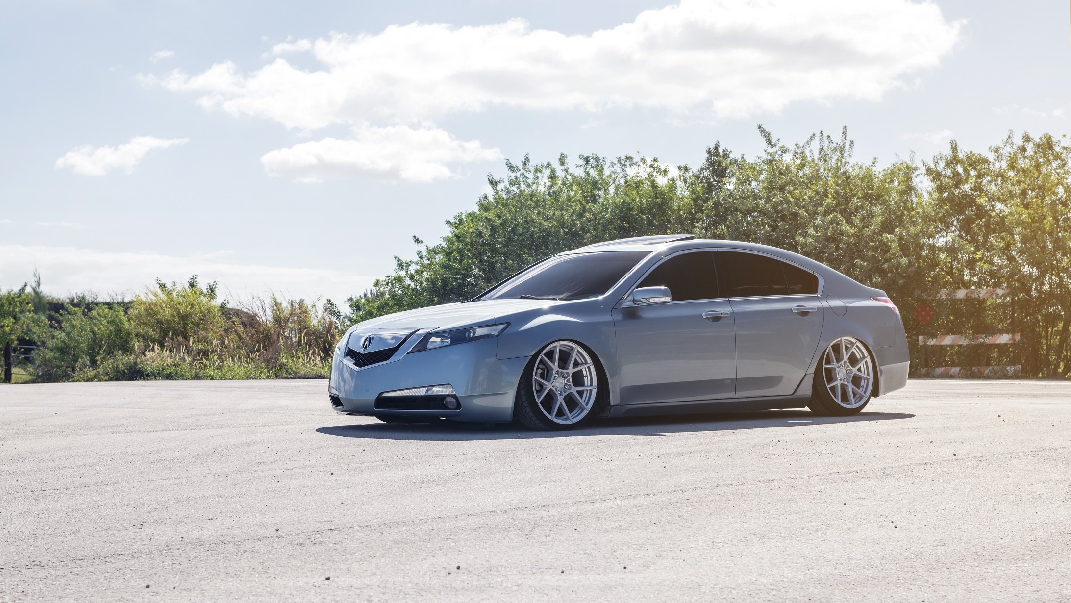 Gray Metallic Acura TL with Aftermarket Front Bumper - Photo by Rotiform