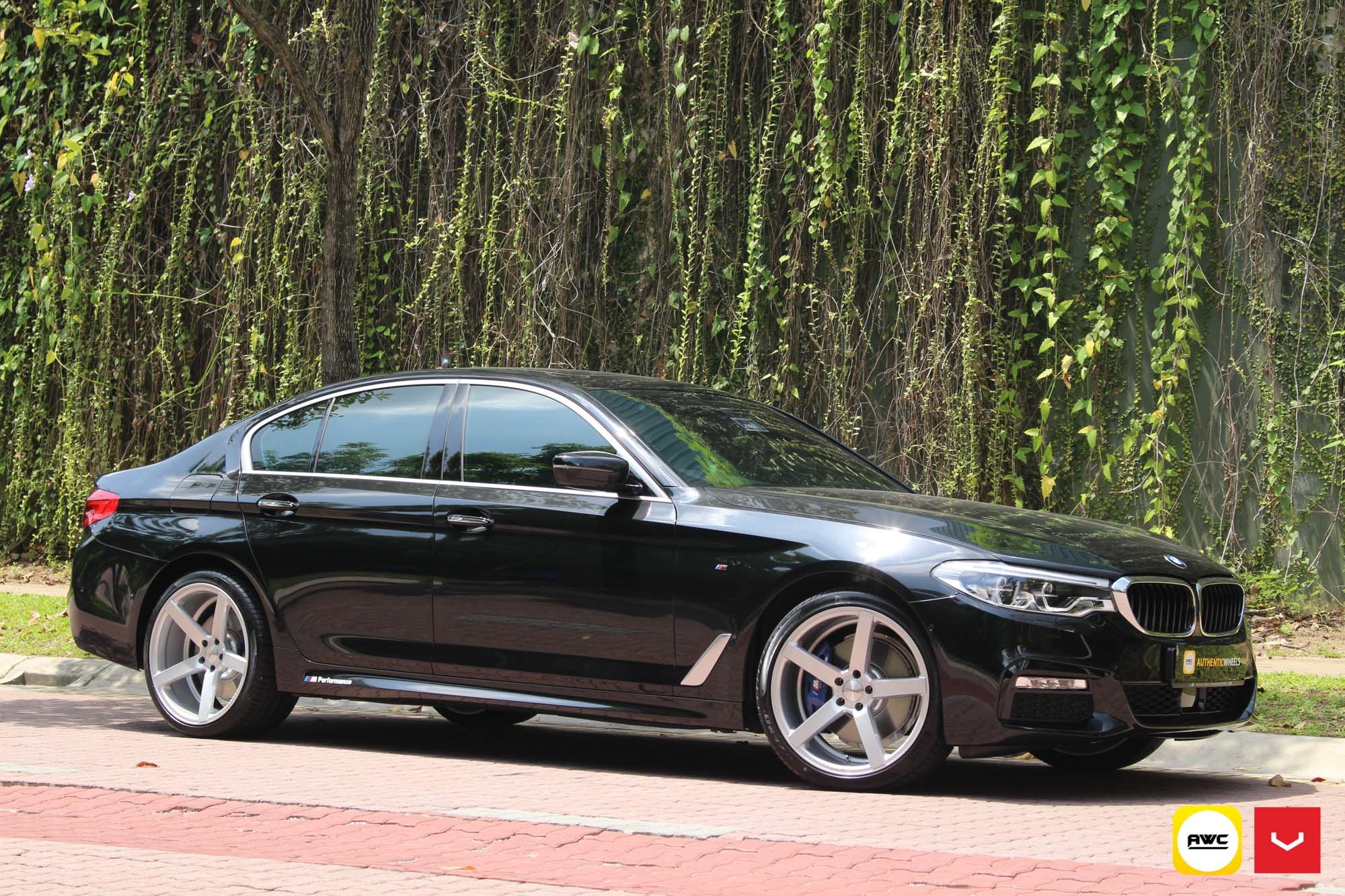 Black BMW 5-Series with Custom Chrome Trim - Photo by Vossen