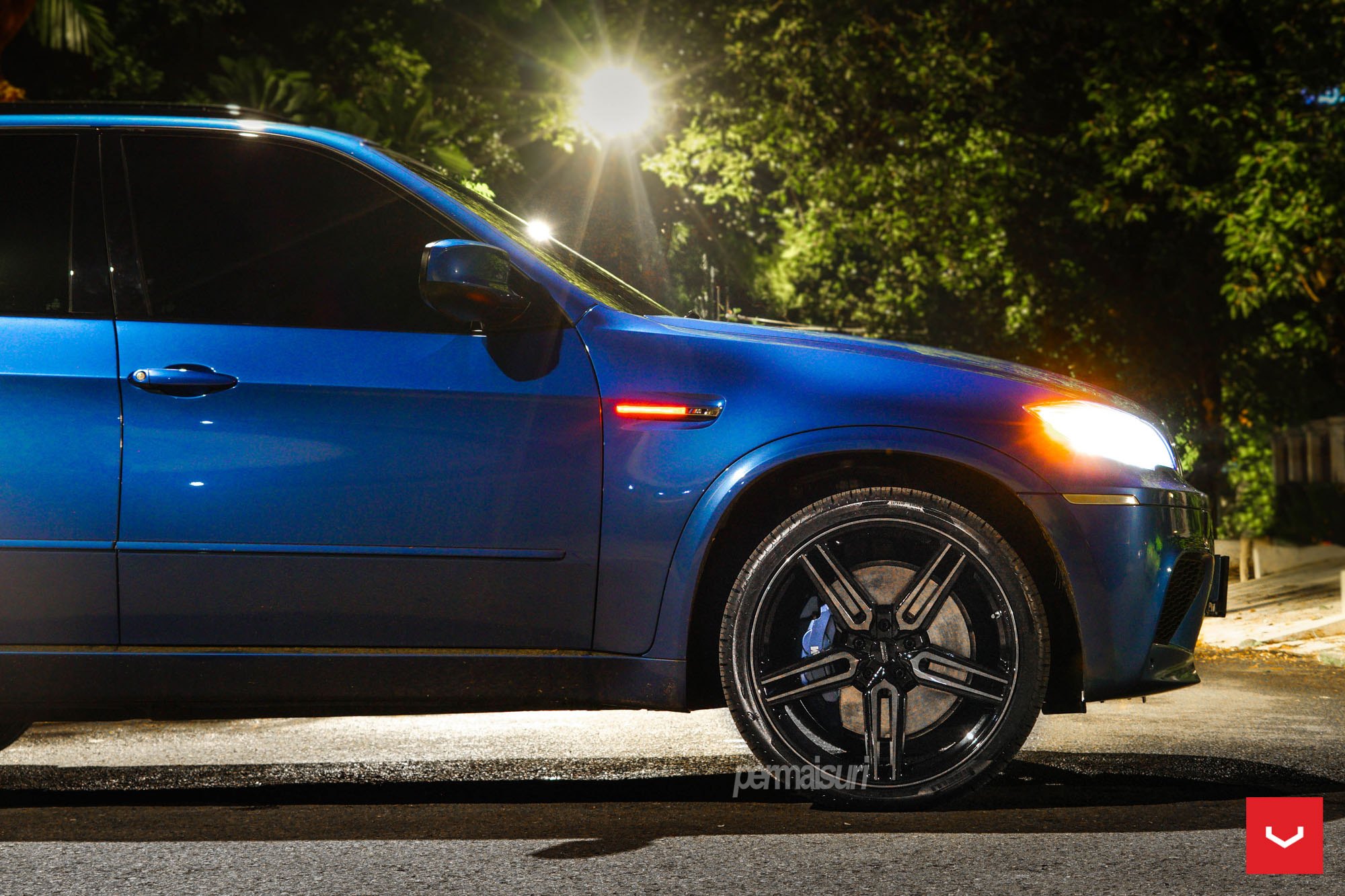 Custom Blue BMW X5 on Pirelli Tires - Photo by Vossen
