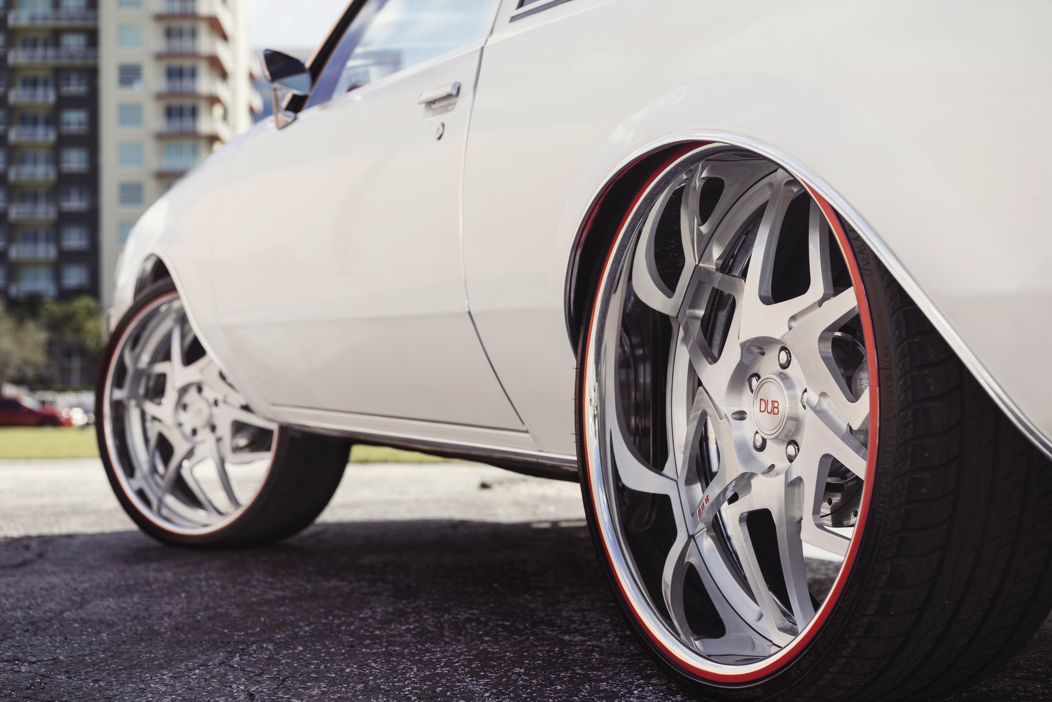 Brushed DUB Wheels with Polished Lip on White Buick Regal - Photo by DUB