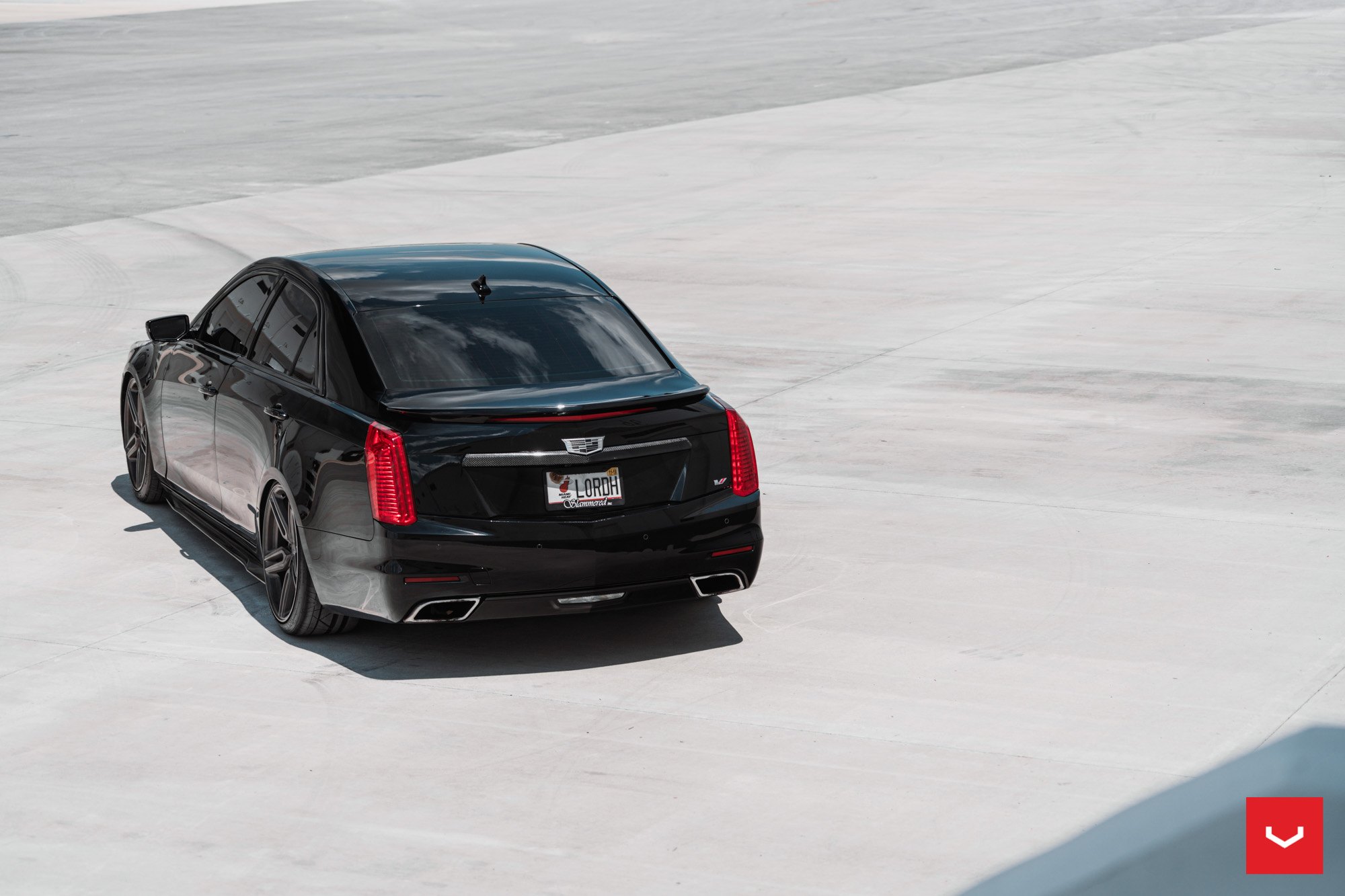 Red LED Taillights on Black Cadillac CTS - Photo by Vossen