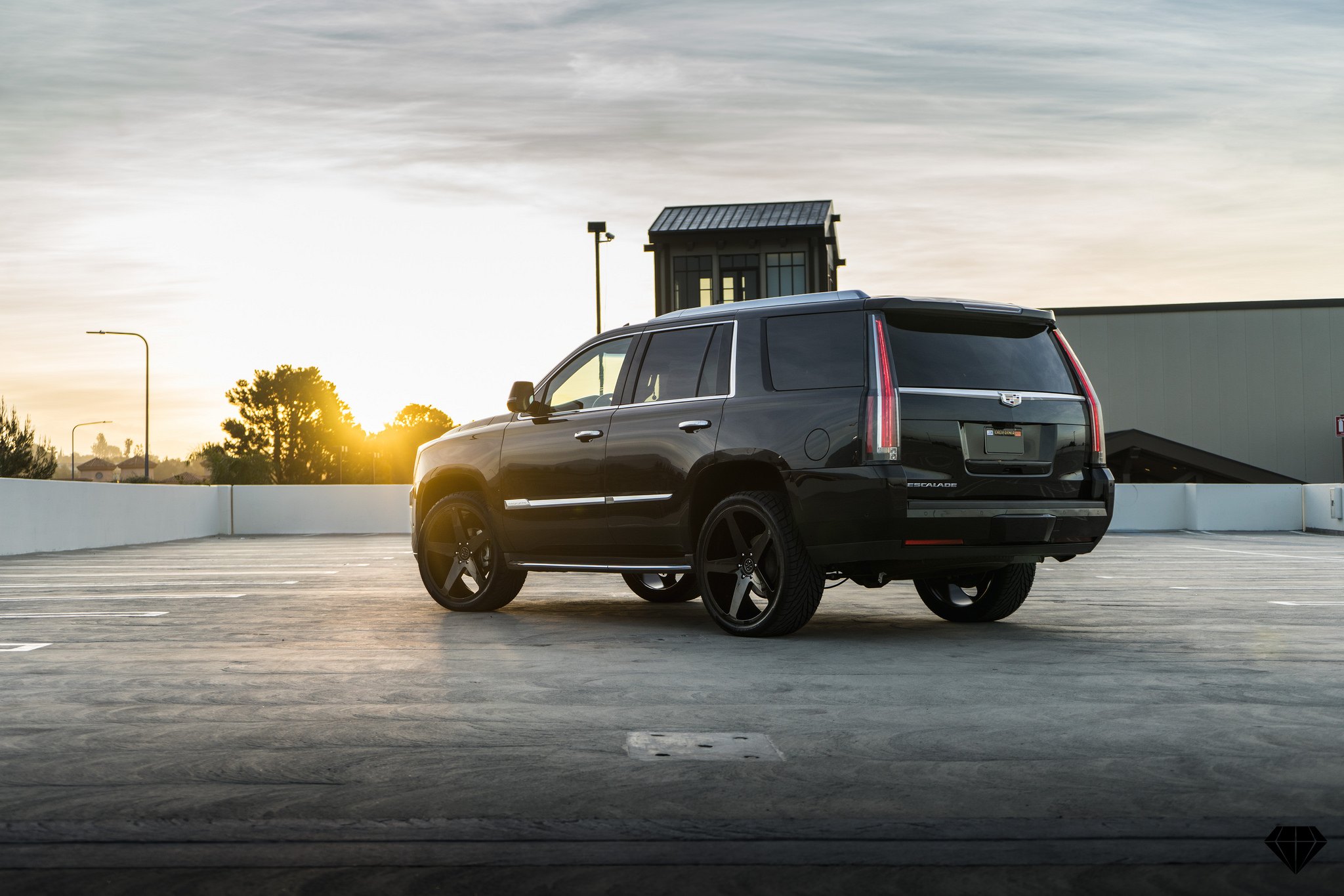 Black Cadillac Escalade with Aftermarket LED Taillights - Photo by Blaque Diamond Wheels