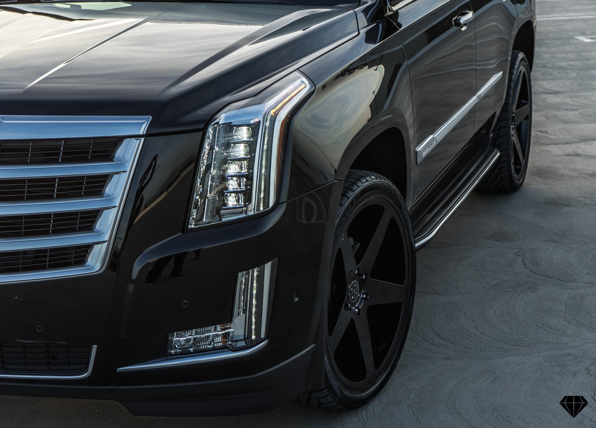 Black Cadillac Escalade with Custom Chrome Billet Grille - Photo by Blaque Diamond Wheels