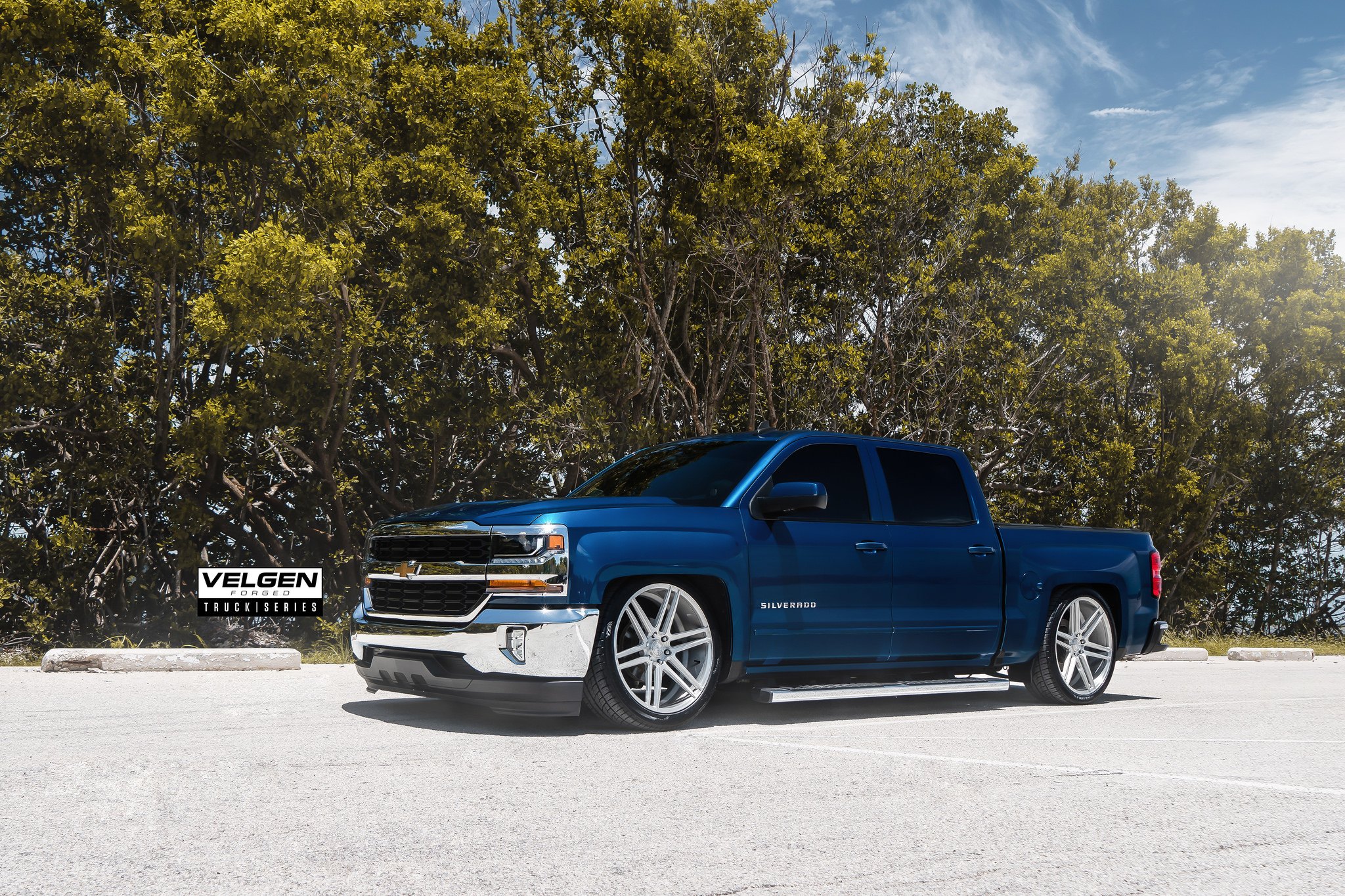 Blue Chevy Silverado with Chrome Front Bumper Cover - Photo by Velgen