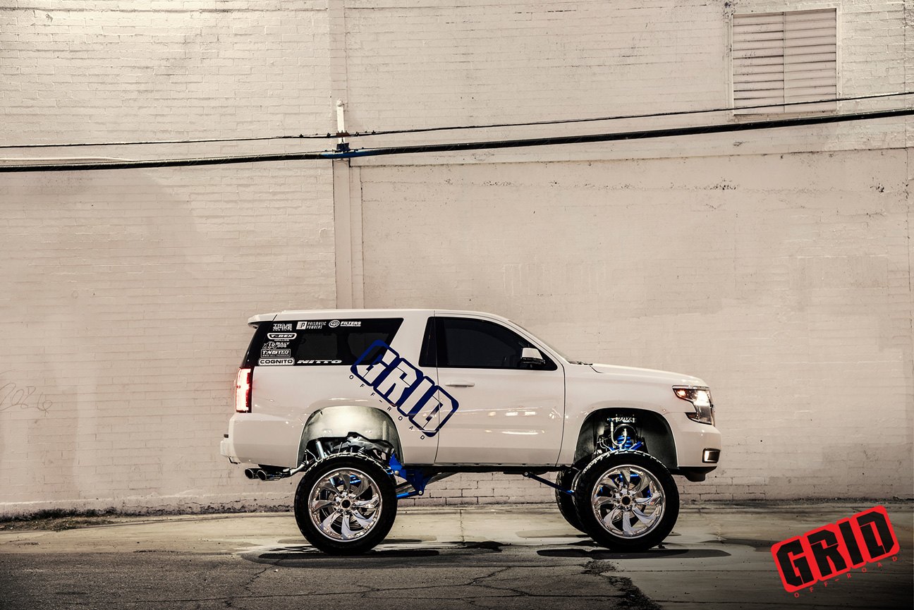 White Chevy Tahoe with Fox Suspension Lift Kit - Photo by Grid Off-Road