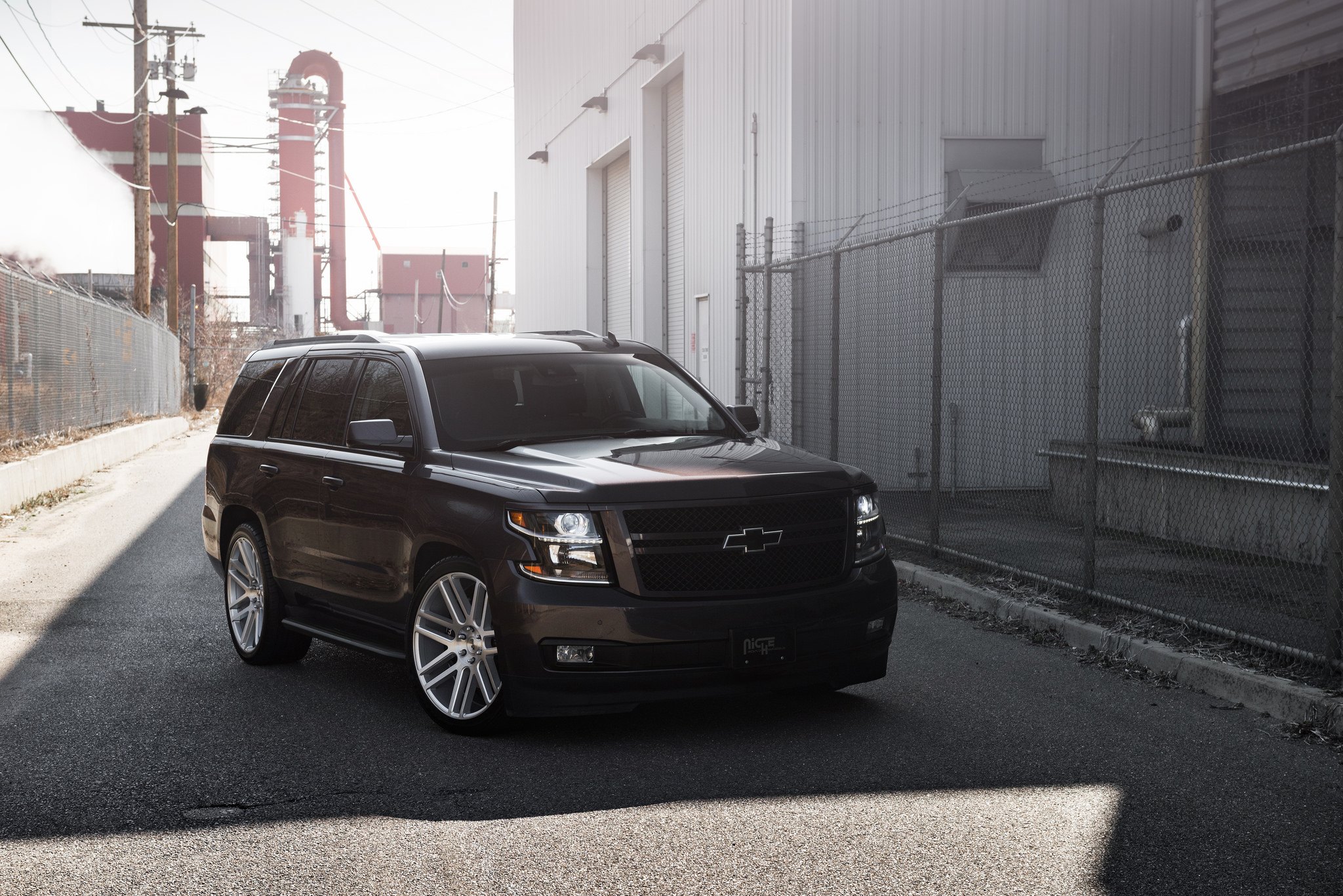 Black Chevy Tahoe with Custom Front Bumper - Photo by Niche Road Wheels
