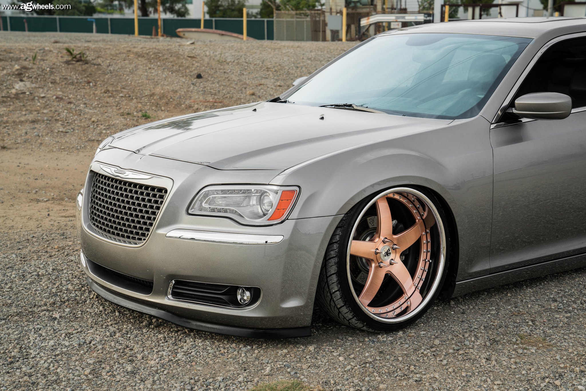 Gray Lowered Chrysler 300 with Custom Headlights - Photo by Avant Garde Wheels