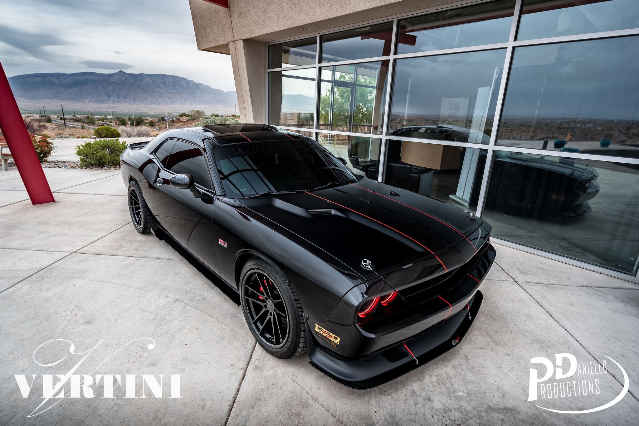 Aftermarket Front Bumper Lip on Black Dodge Challenger - Photo by Vertini Wheels