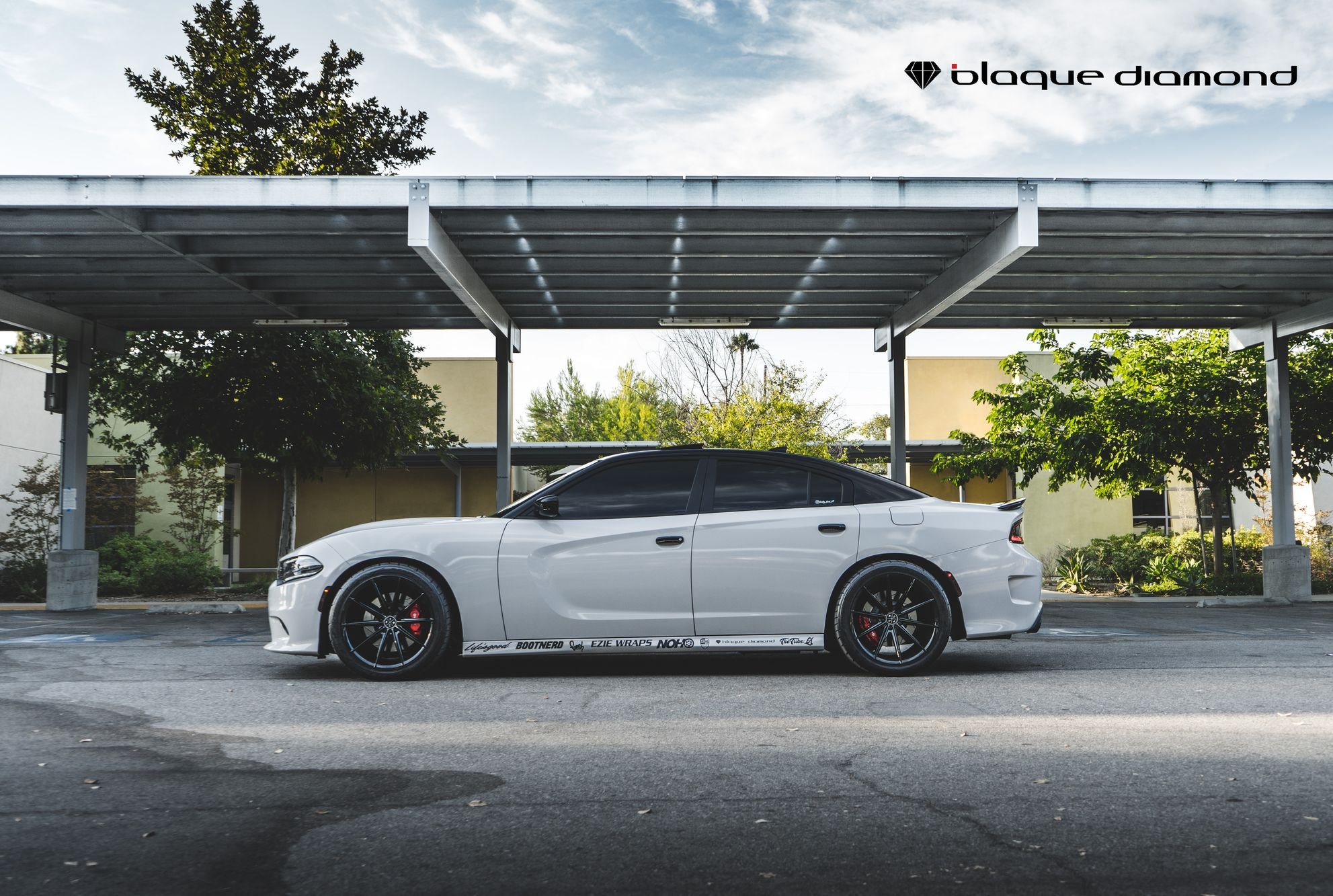 White Dodge Charger with Aftermarket Side Skirts - Photo by Blaque Diamond