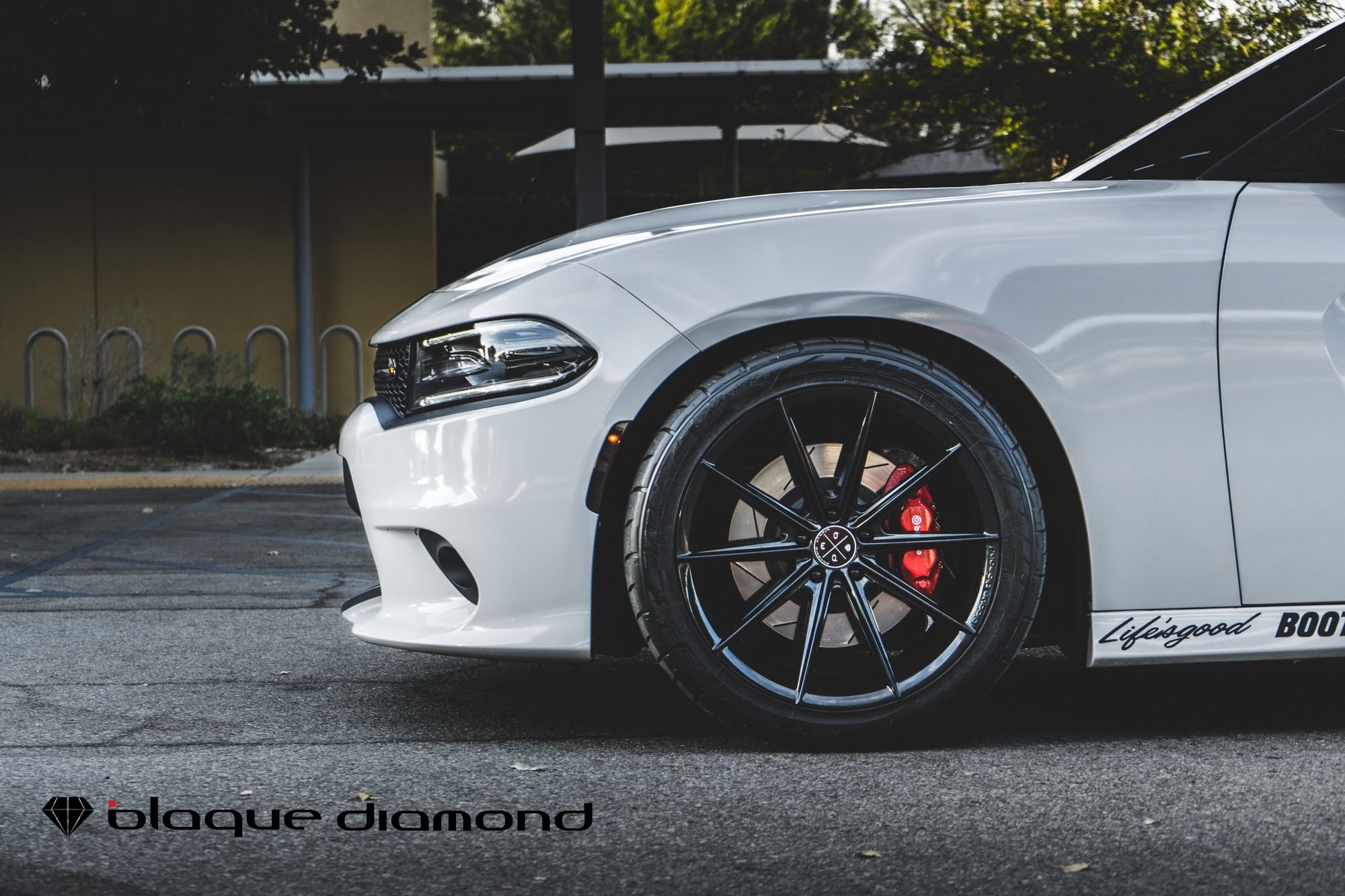 Red Brembo Brakes on White Dodge Charger - Photo by Blaque Diamond