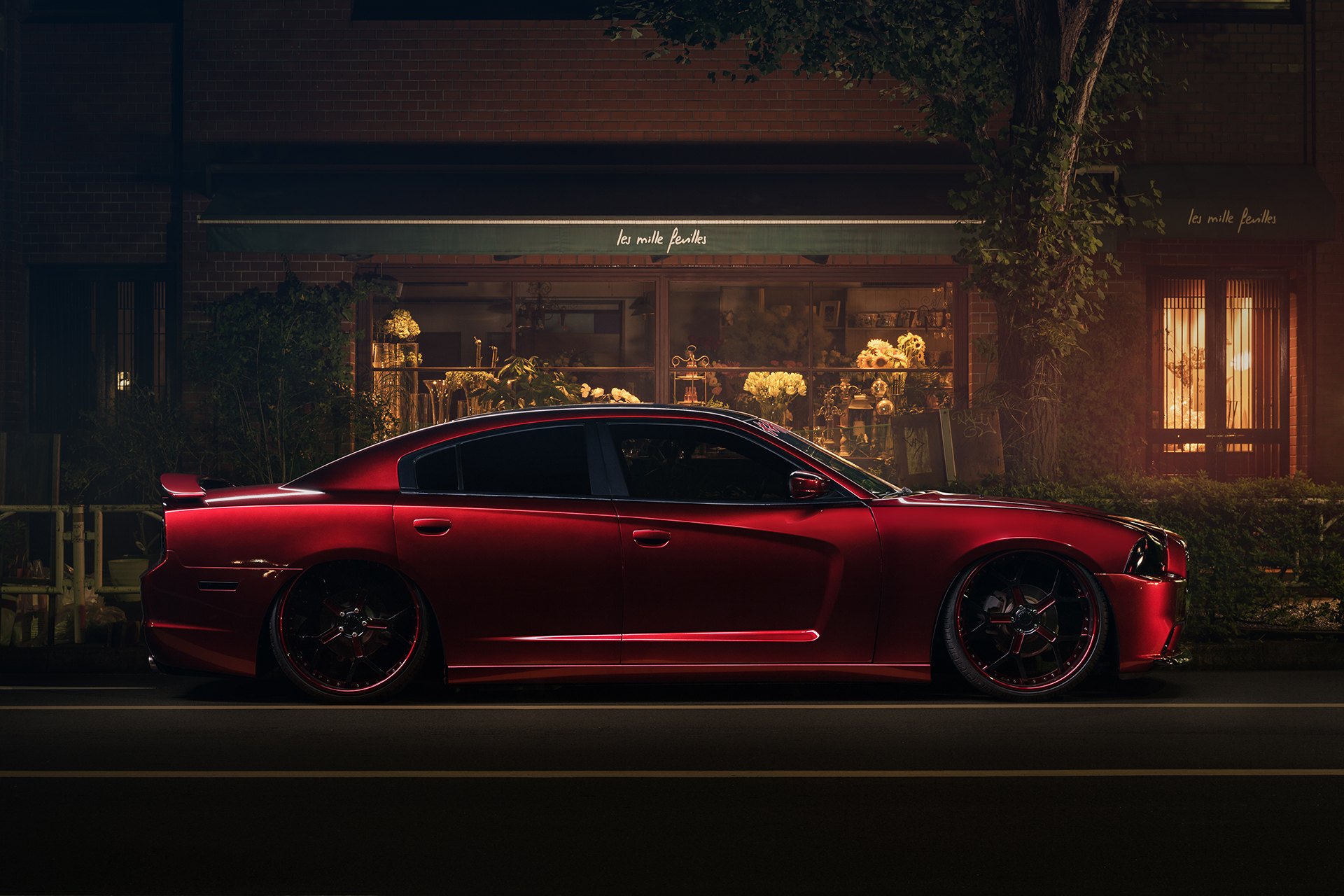 Aftermarket Side Skirts on Red Dodge Charger - Photo by Forgiato