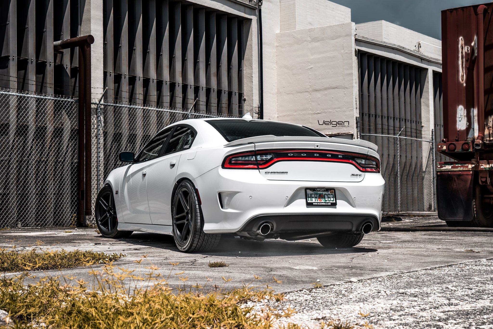 Aftermarket Rear Spoiler on White Dodge Charger - Photo by Velgen