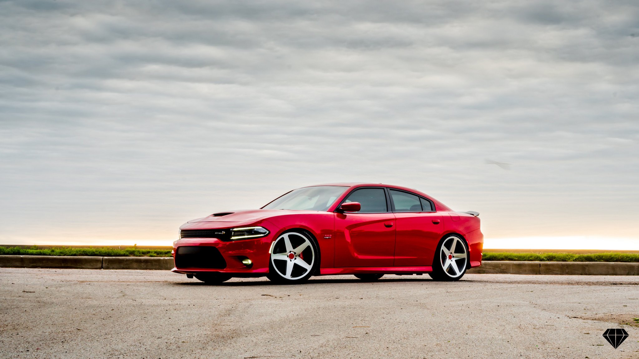 Blacked Out Mesh Grille on Red Dodge Charger - Photo by Blaque Diamond Wheels