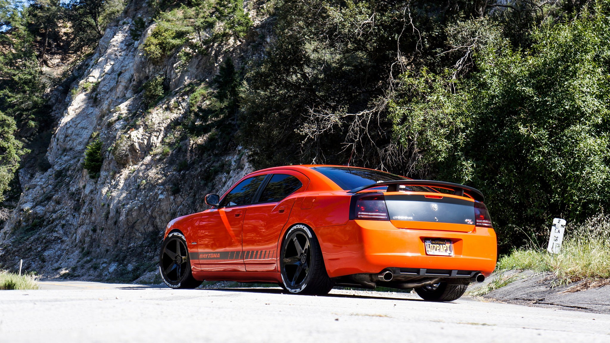 Aftermarket Rear Spoiler on Orange Dodge Charger - Photo by Blaque Diamond Wheels