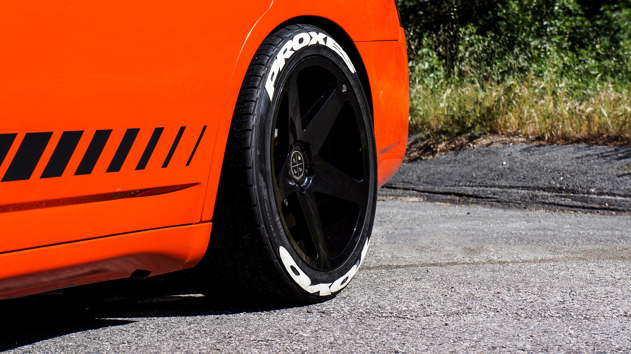Toyo Proxes Tires on Orange Dodge Charger RT - Photo by Blaque Diamond Wheels