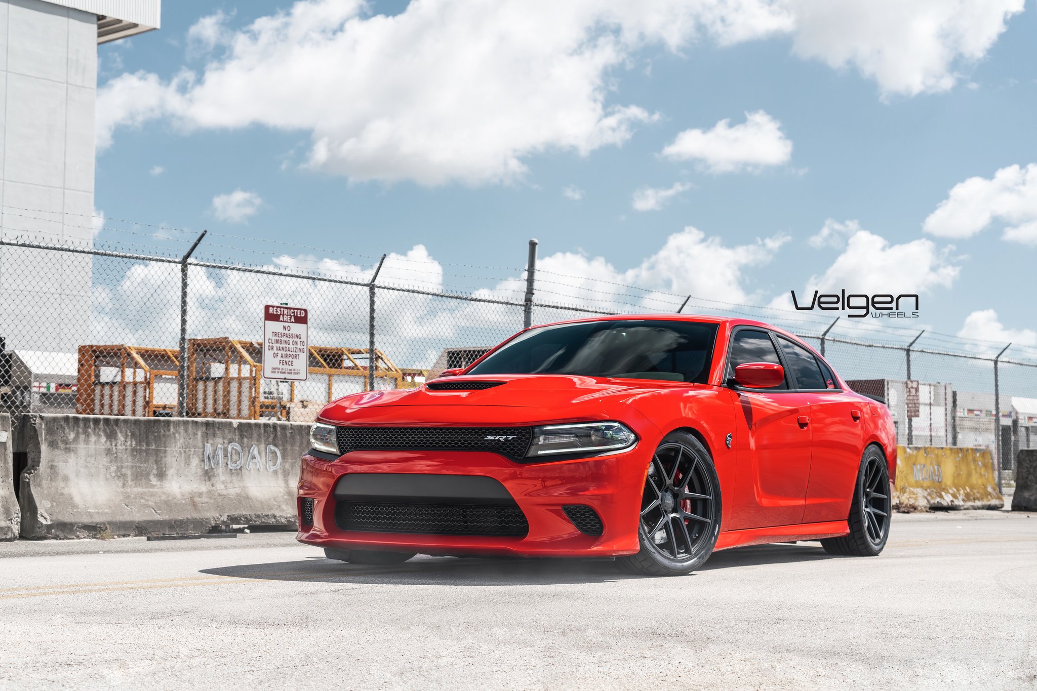 Blacked Out Mesh Grille on Red Dodge Charger SRT - Photo by Velgen Wheels