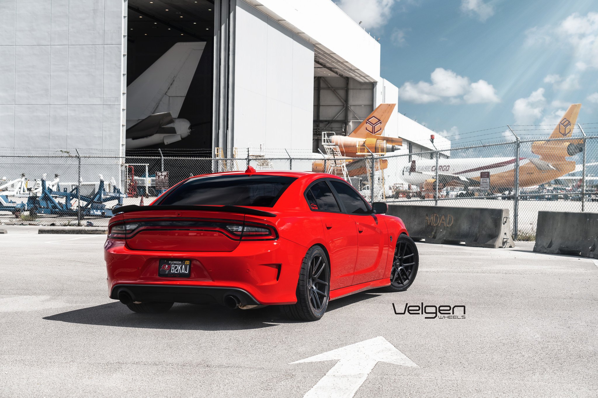 Aftermarket Rear Diffuser on Red Dodge Charger SRT - Photo by Velgen Wheels