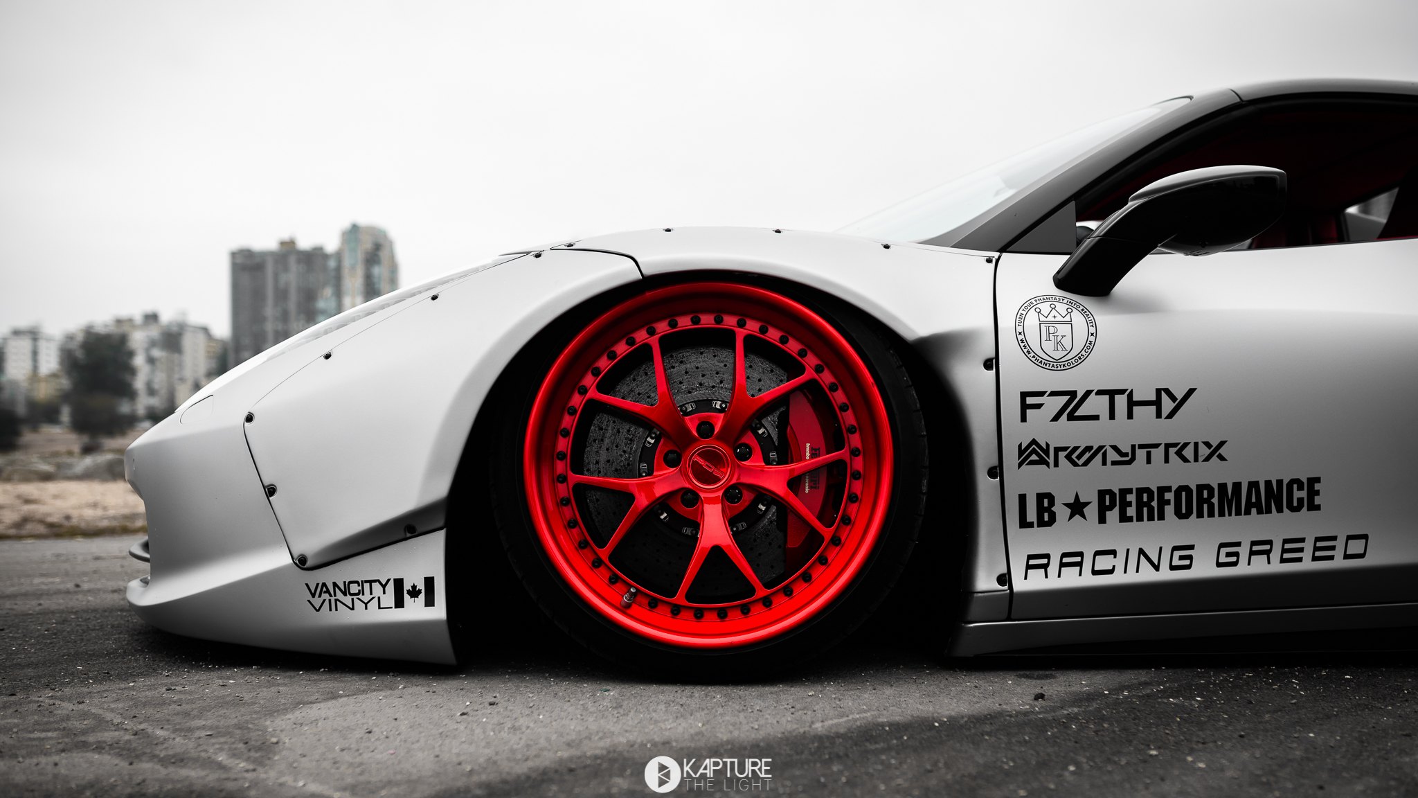 Custom Red Wheels on White Debadged Ferrari 458 - Photo by Kelen Loewen