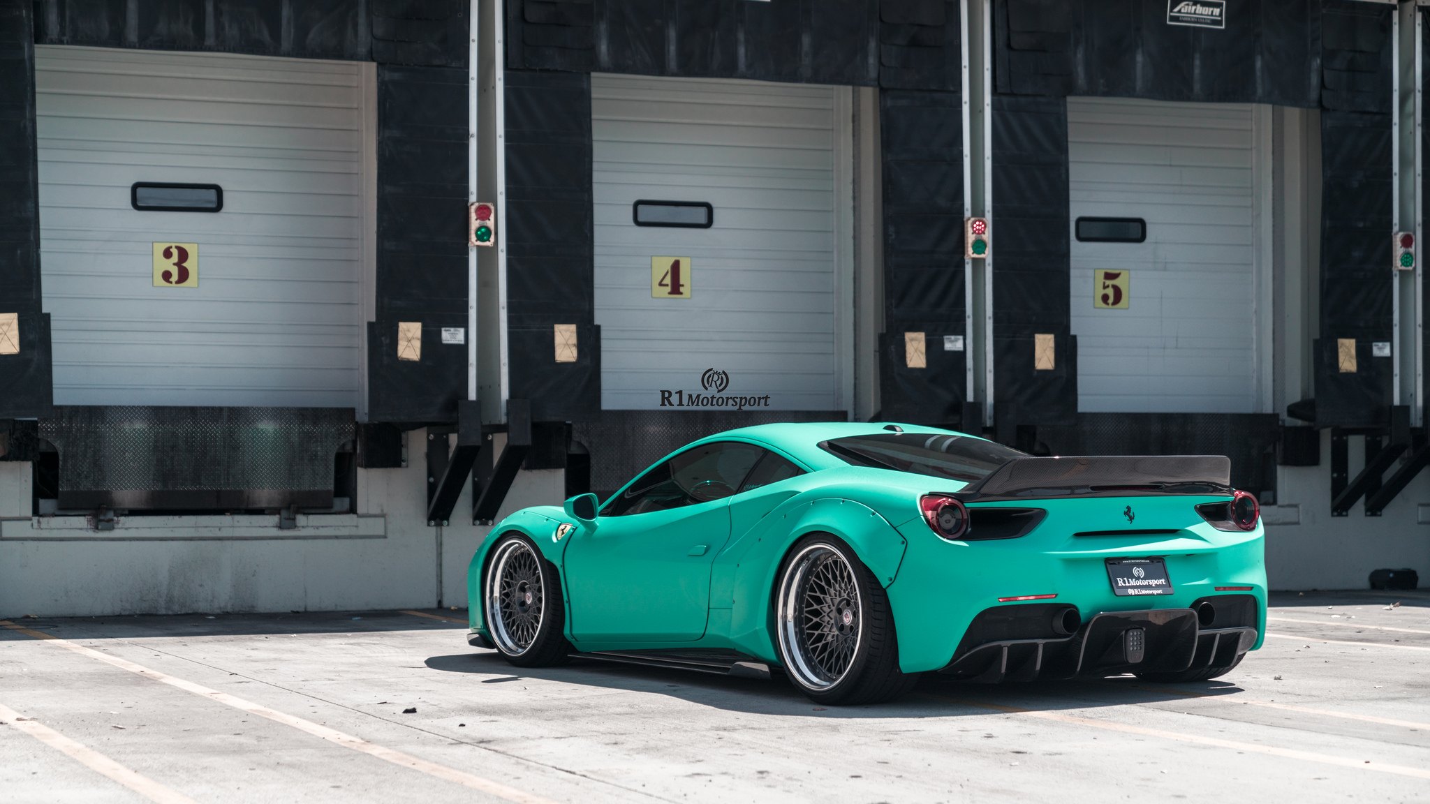 Mint Ferrari 488 with Aftermarket Rear Spoiler - Photo by HRE Wheels