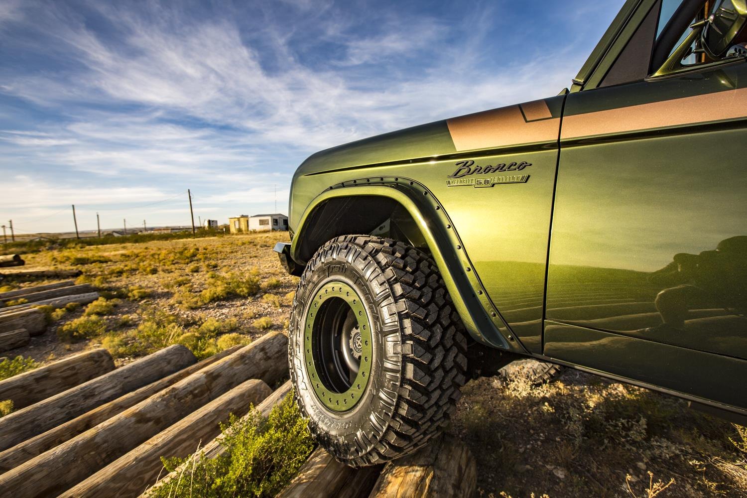 Green Lifted Ford Bronco with Aftermarket Fender Flares - Photo by Roadster Shop
