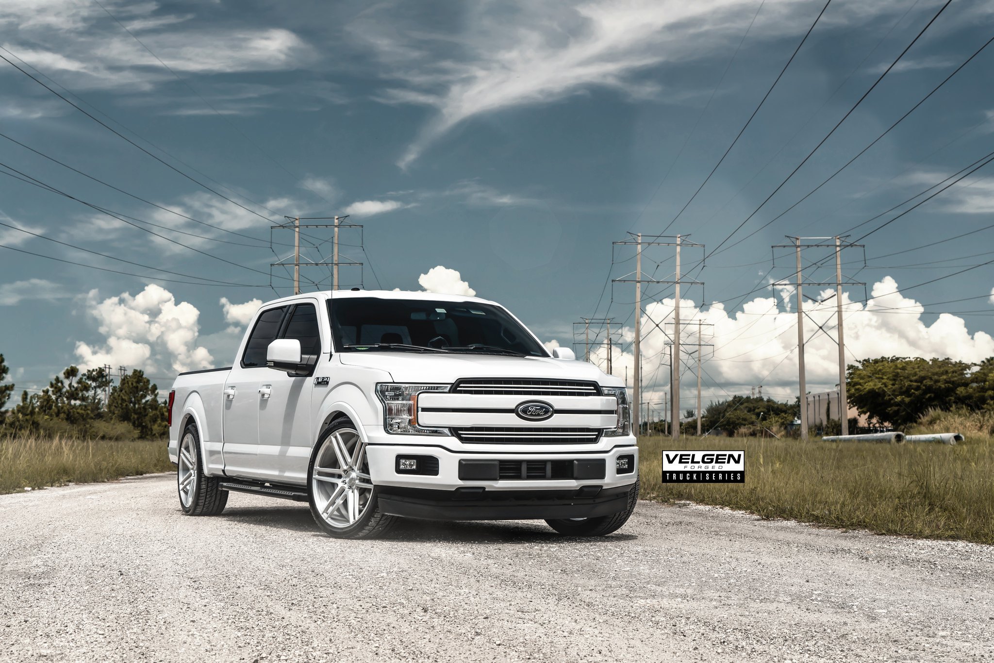 Custom Crystal Clear Headlights on White Ford F-150 - Photo by Velgen
