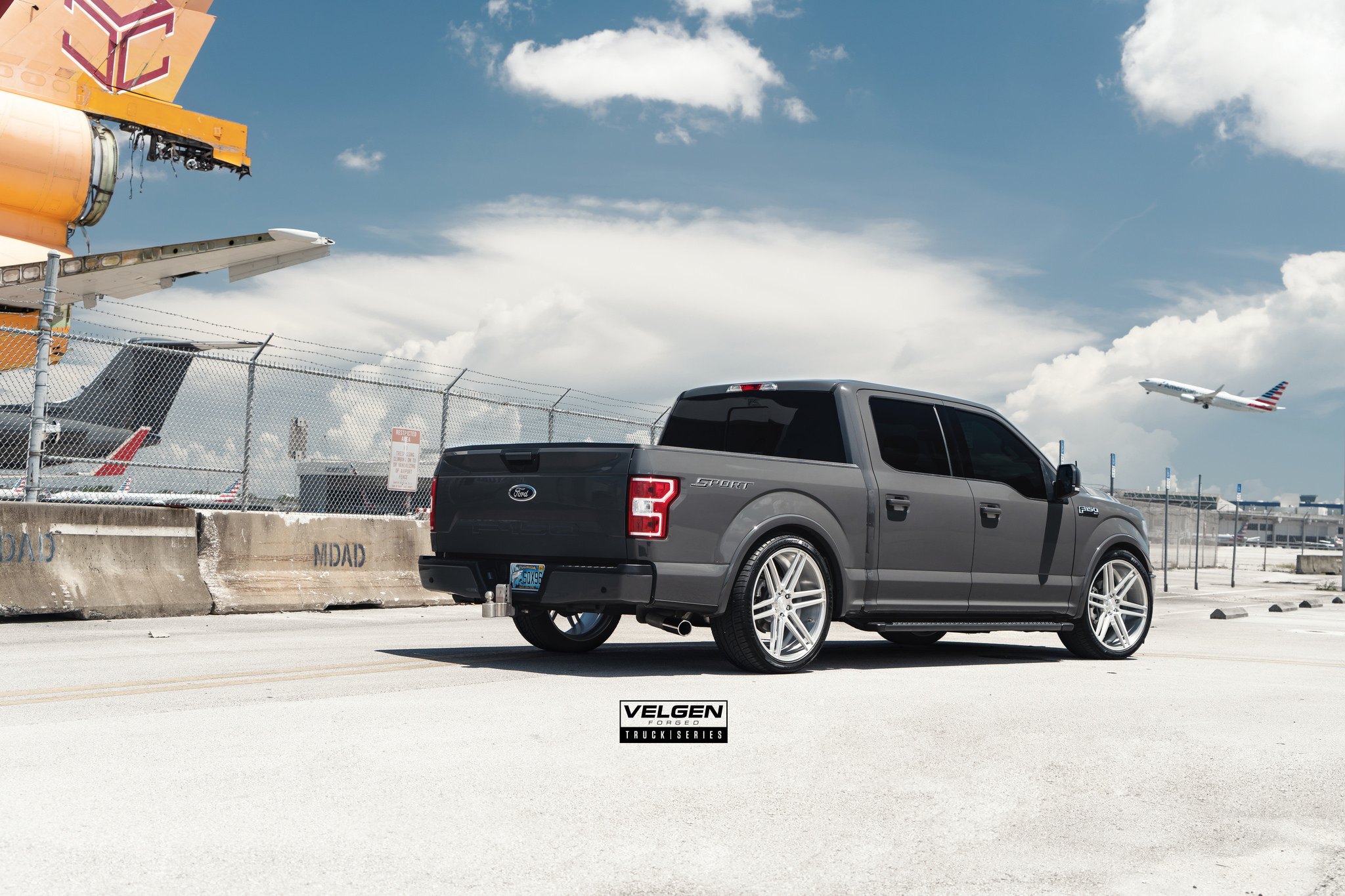 Custom Red LED Taillights on Gray Ford F-150 Sport - Photo by Velgen