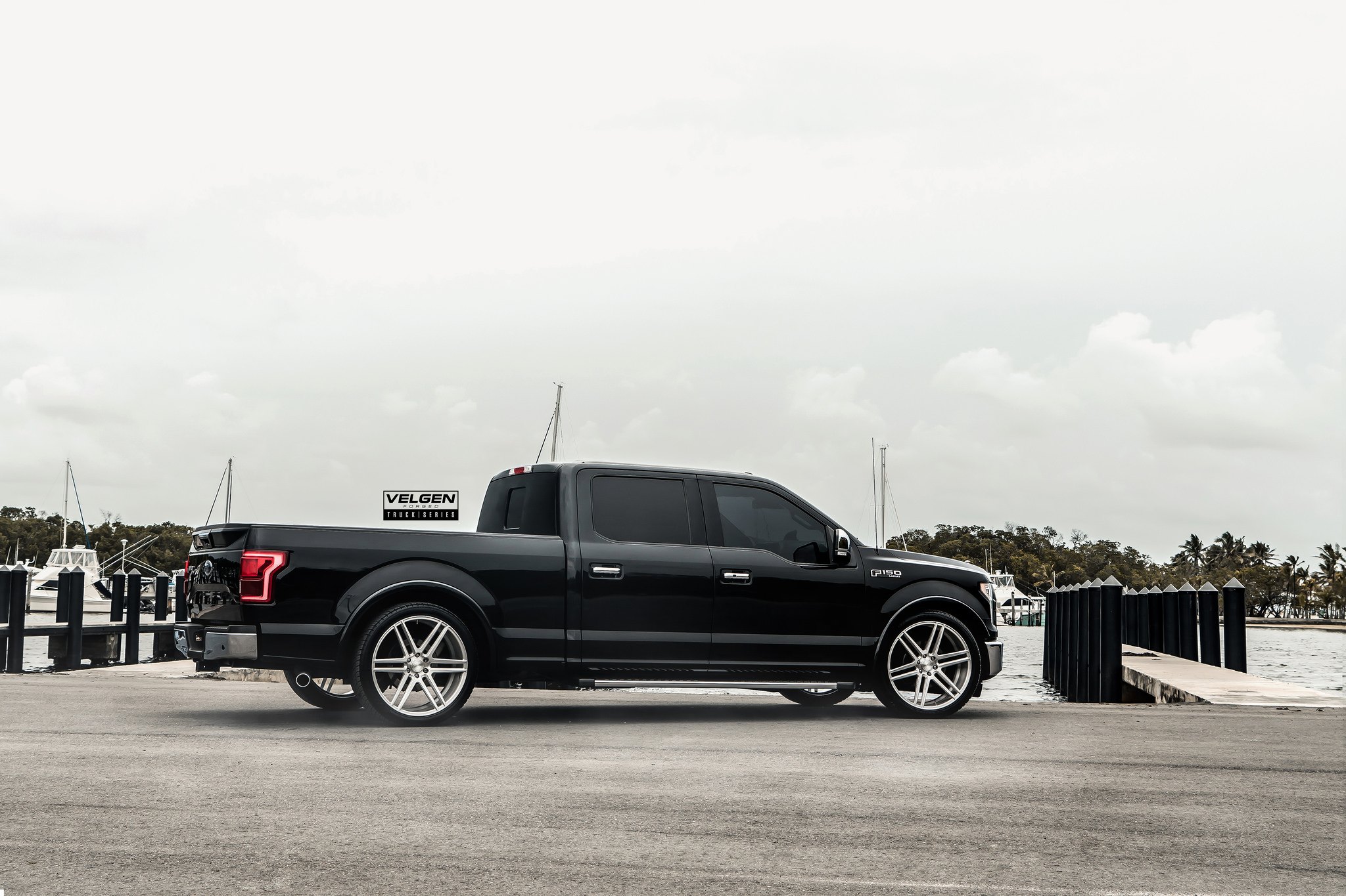 Aftermarket Red LED Taillights on Black Ford F-150 - Photo by Velgen