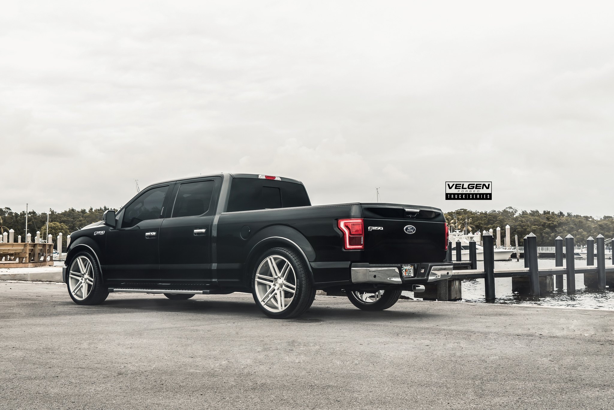 Black Ford F-150 Lariat with Chrome Rear Bumper Cover - Photo by Velgen