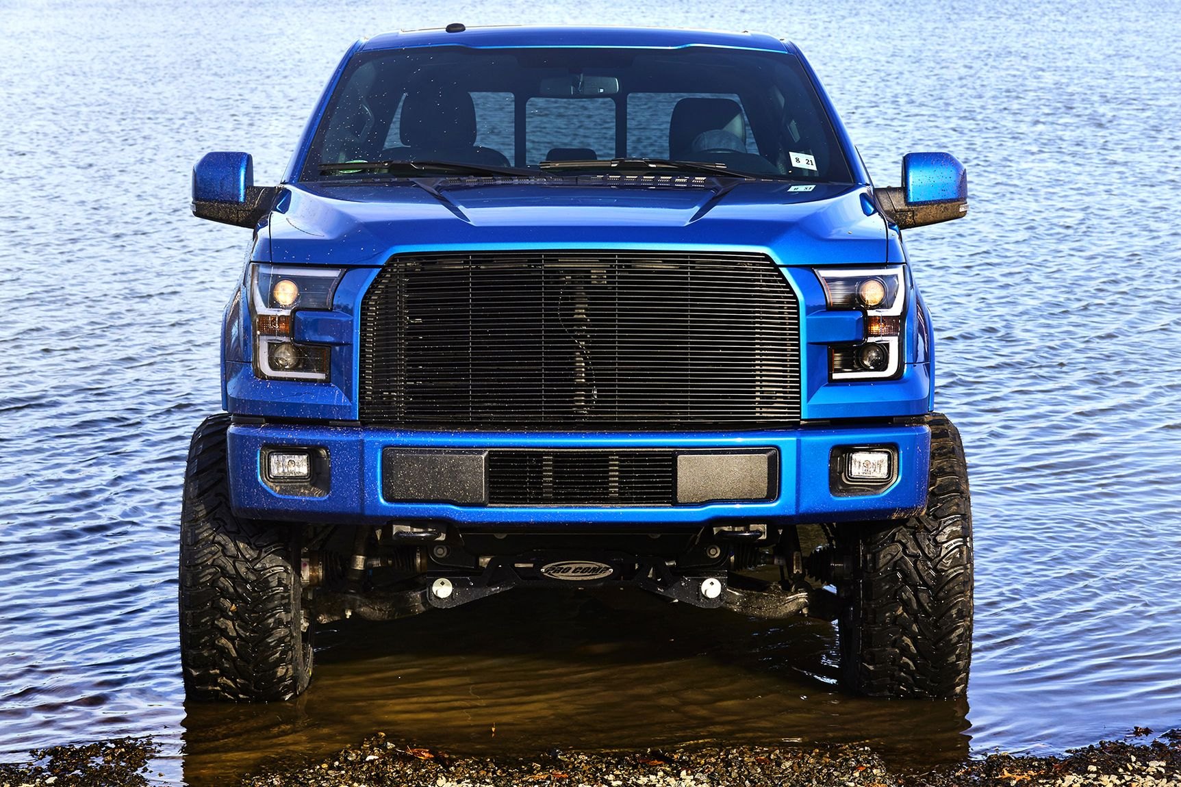 Pro Comp Suspension Kit on Blue Lifted Ford F-150 - Photo by CARiD