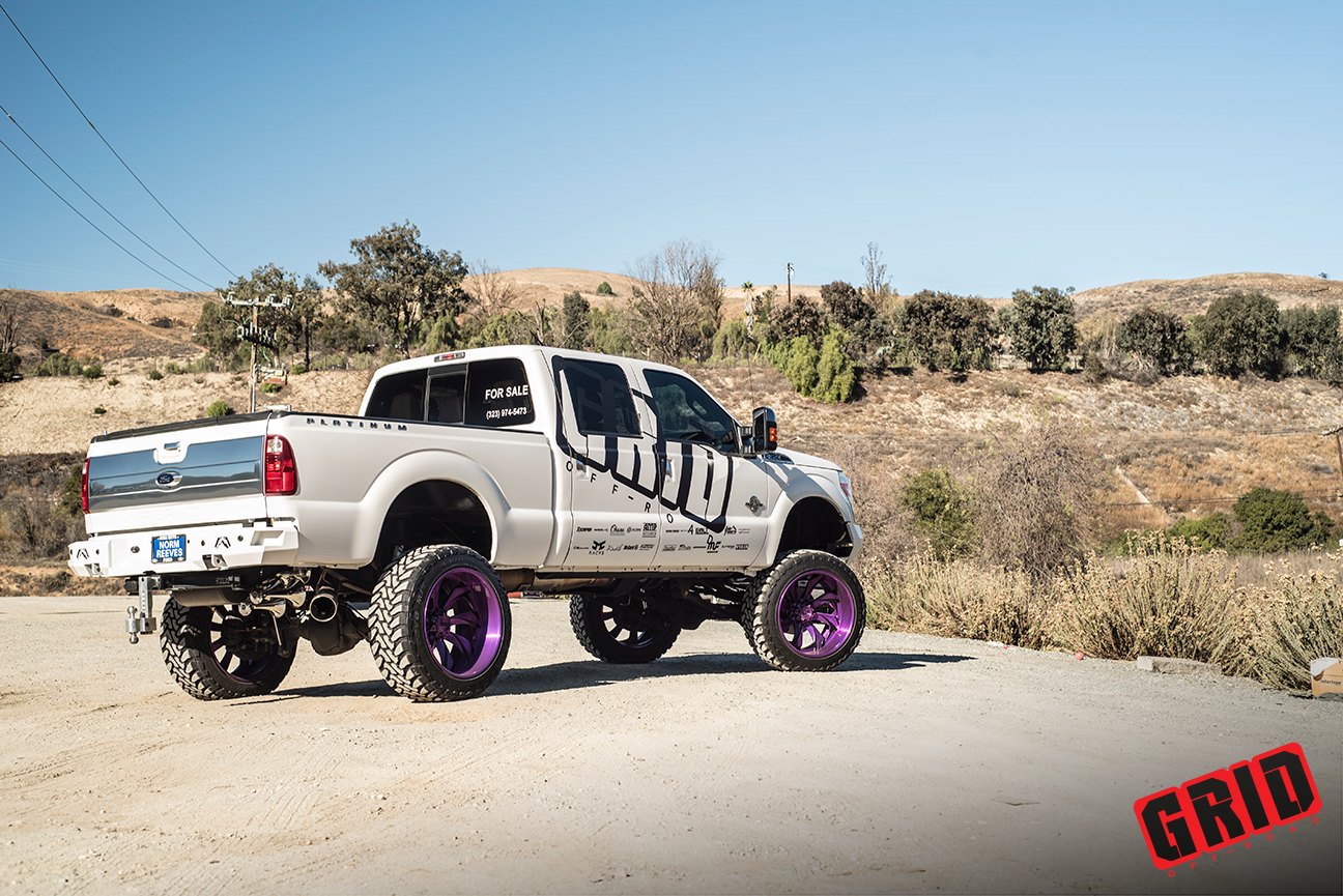 White Ford F250 With Purple Off-road Wheels - Photo by Grid Off-road
