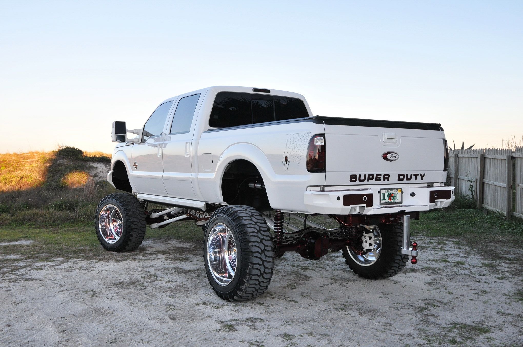 White Lifted Ford Superduty with Off-road Rear Bumper - Photo by Joe Greeves