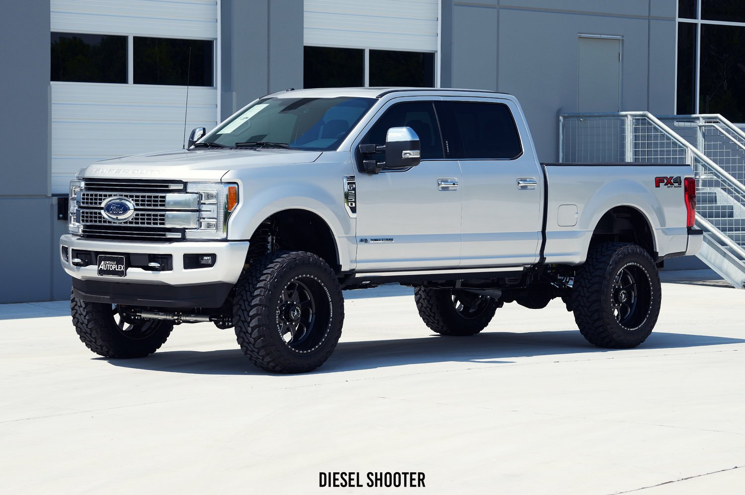 Lifted Ford F-250 on Custom American Force Wheels - Photo by Diesel Shooter