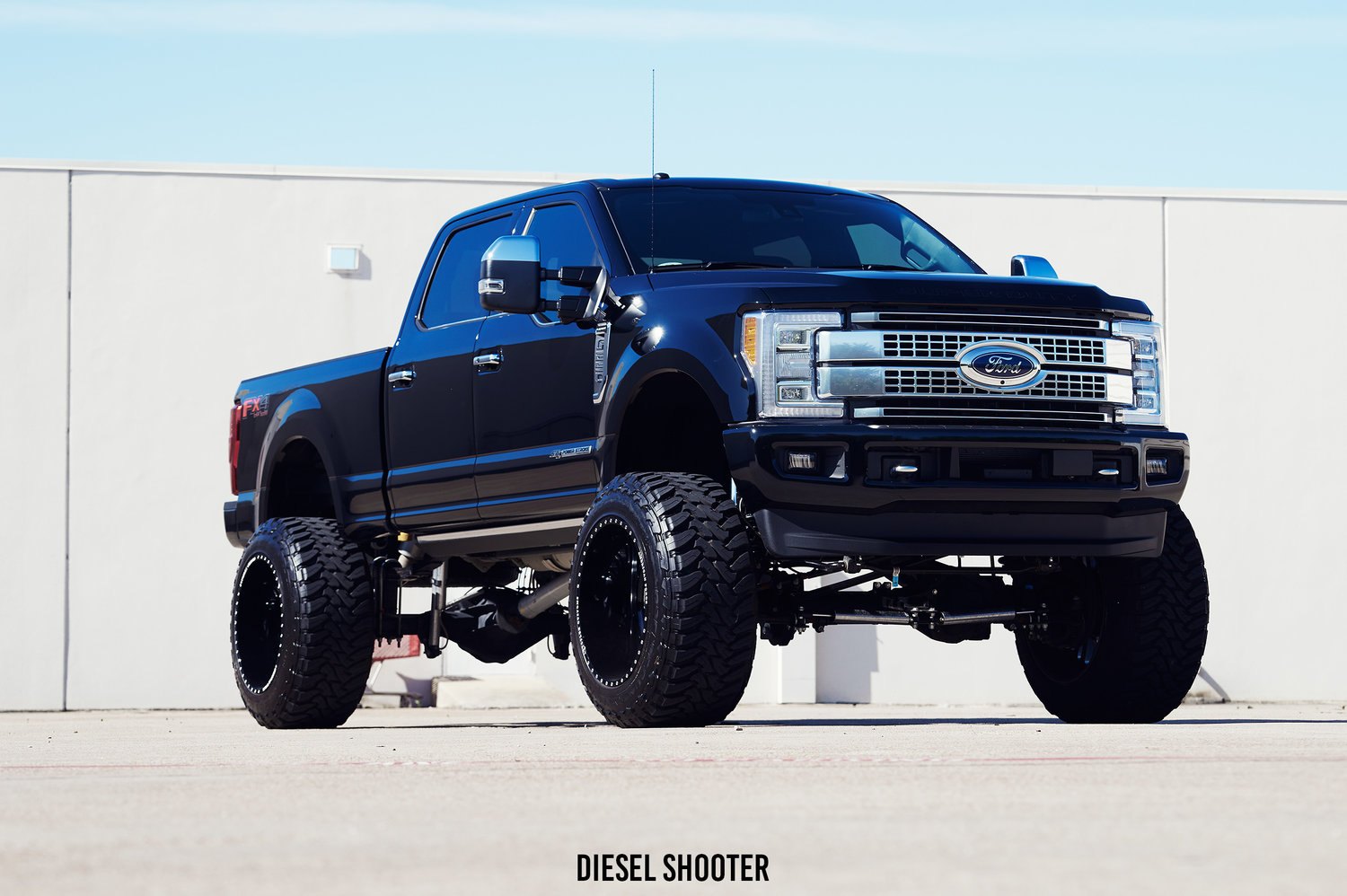 Custom Lifted Ford F-250 on 24 Inch American Force Wheels - Photo by Diesel Shooter