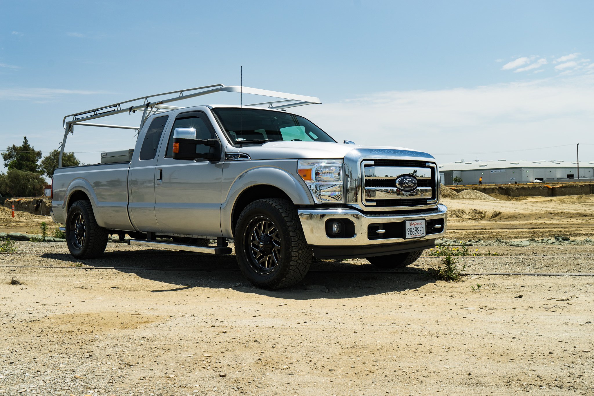 Silver Ford F-250 with Full Cab Chase Rack - Photo by Fuel Offroad