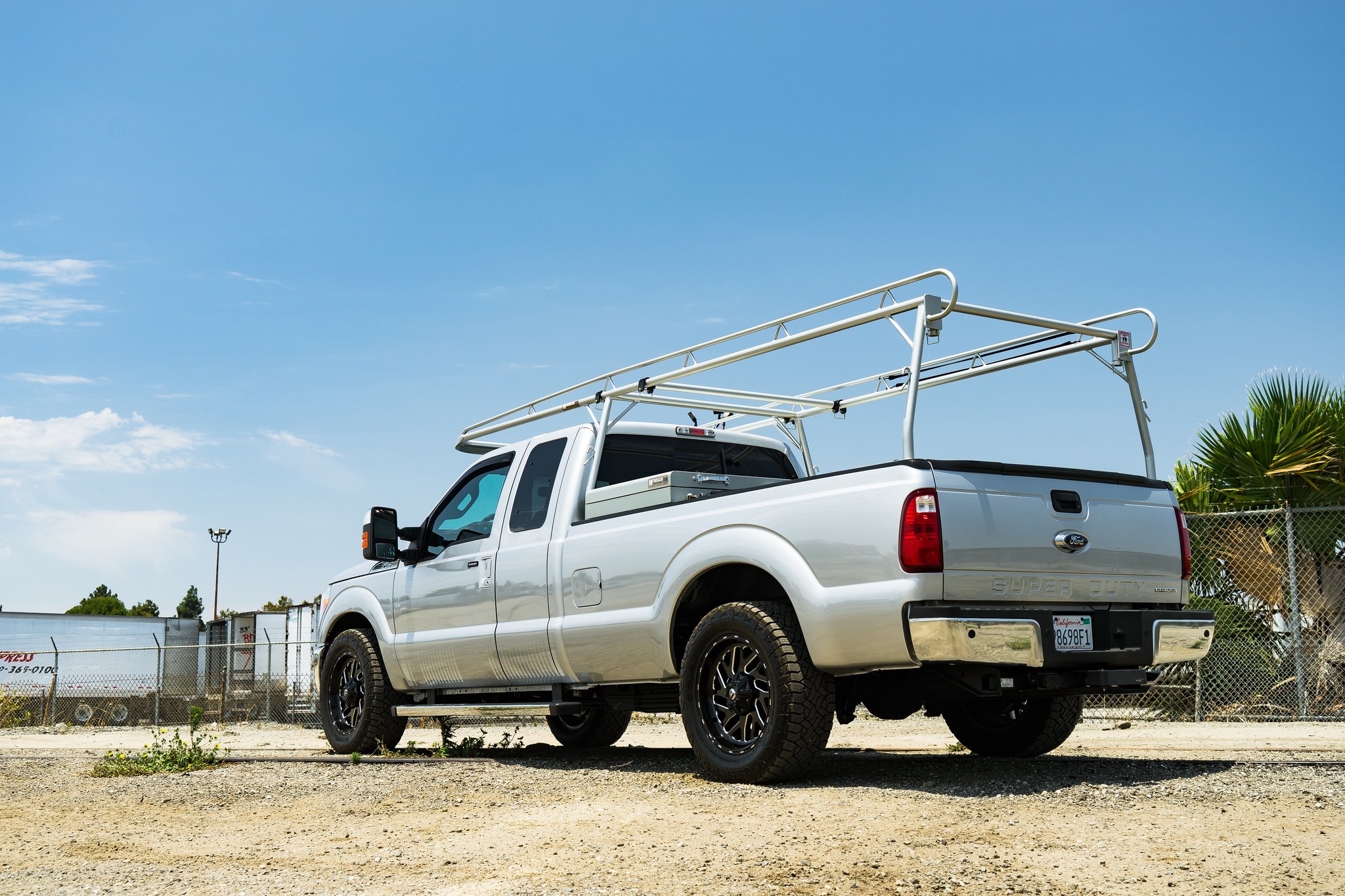 Silver Ford F-250 Super Duty Aftermarket Rear Bumper - Photo by Fuel Offroad