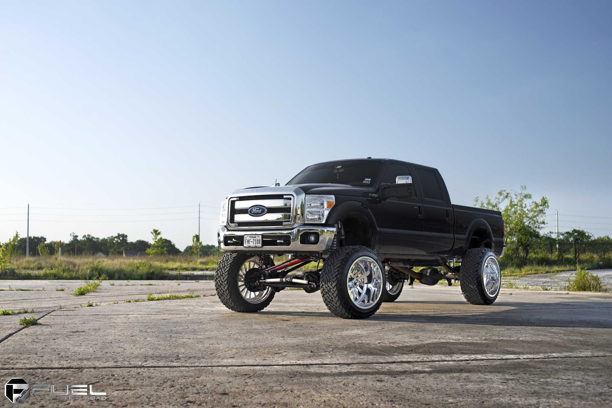Black Ford F-250 with 12 Inch Lift Kit - Photo by Fuel Offroad