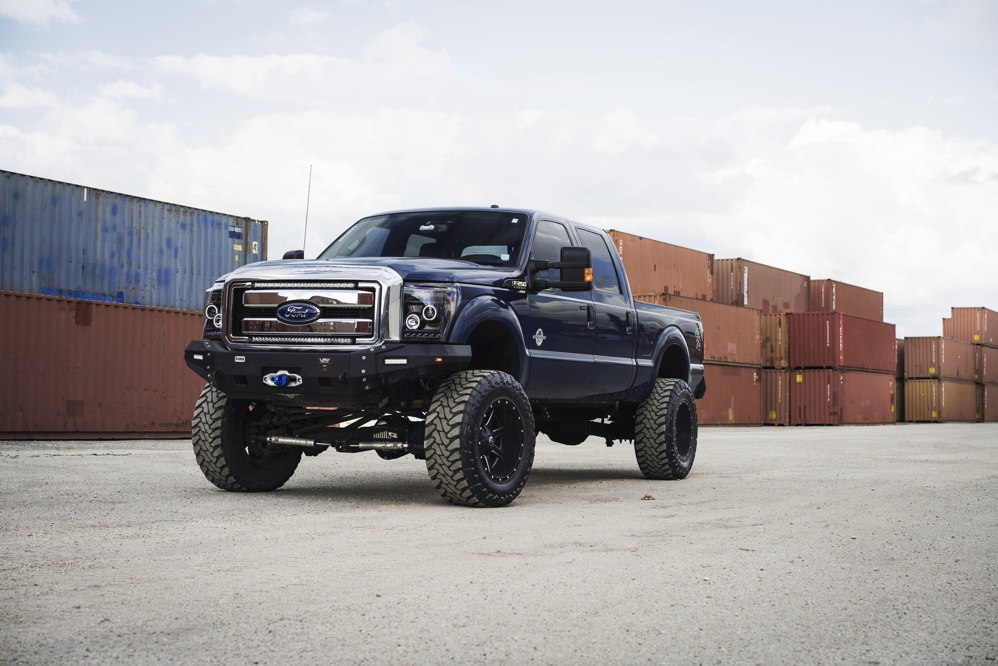 Blue Ford F-250 with Custom Halo Headlights - Photo by Fuel Offroad