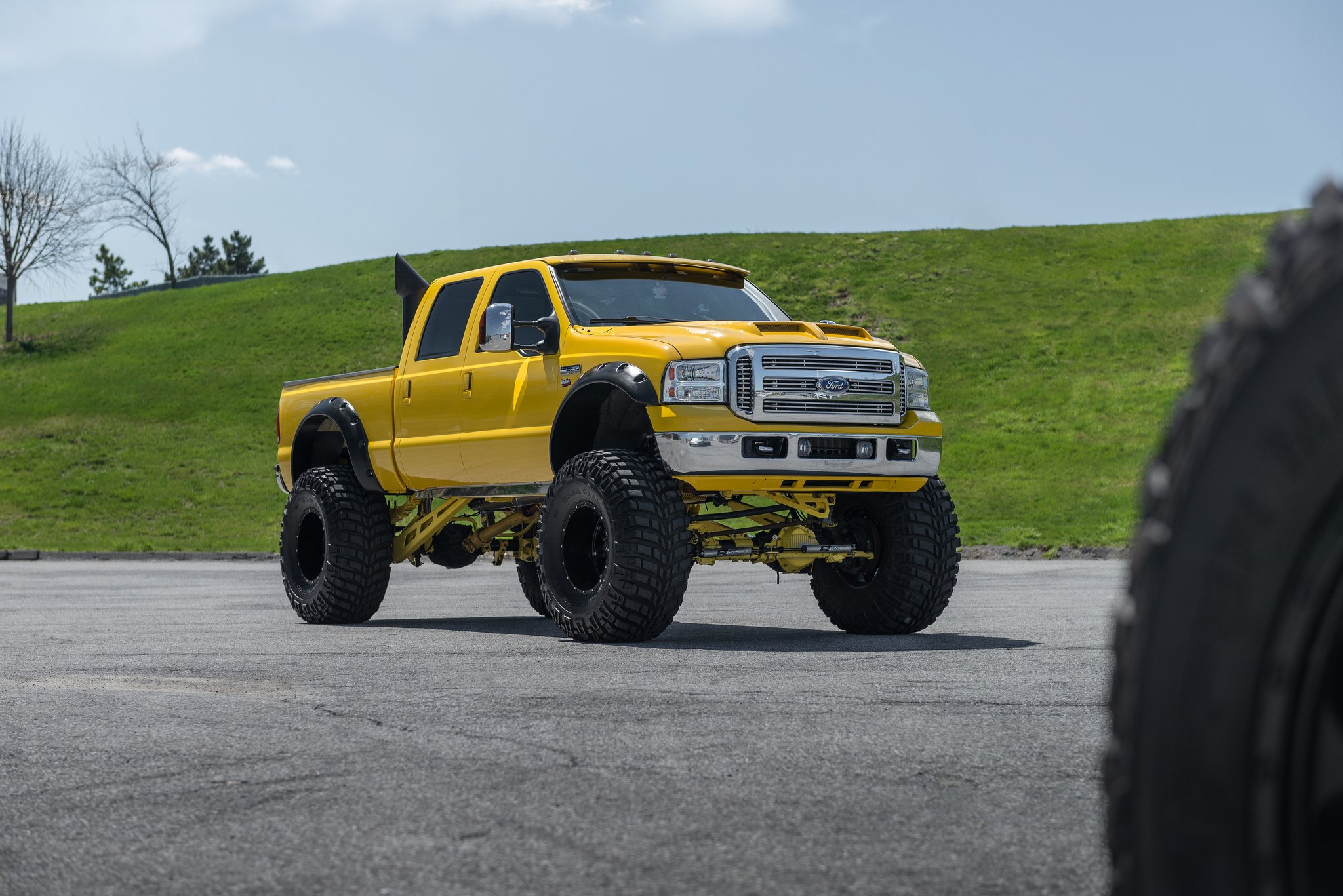 Custom Yellow Lifted Ford F-250 Super Duty - Photo by Fuel Offroad