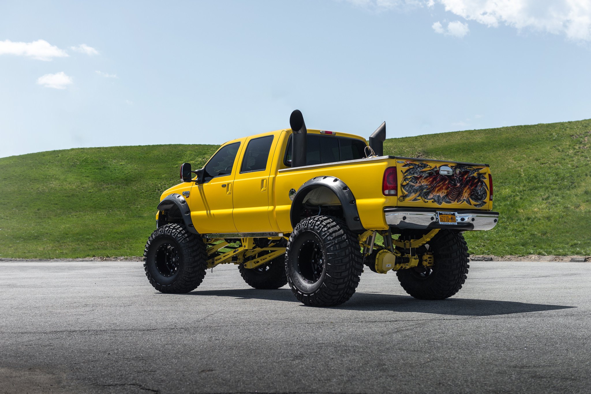 Custom Airbrushed Rear Bumper on Yellow Ford F-250 - Photo by Fuel Offroad