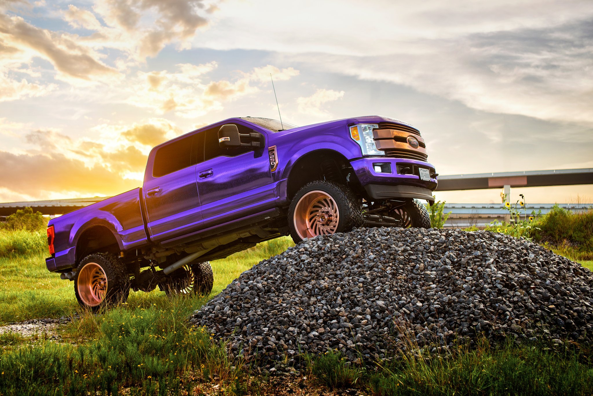 Purple Lifted Ford F-250 with Custom Copper Grille - Photo by Fuel Offroad
