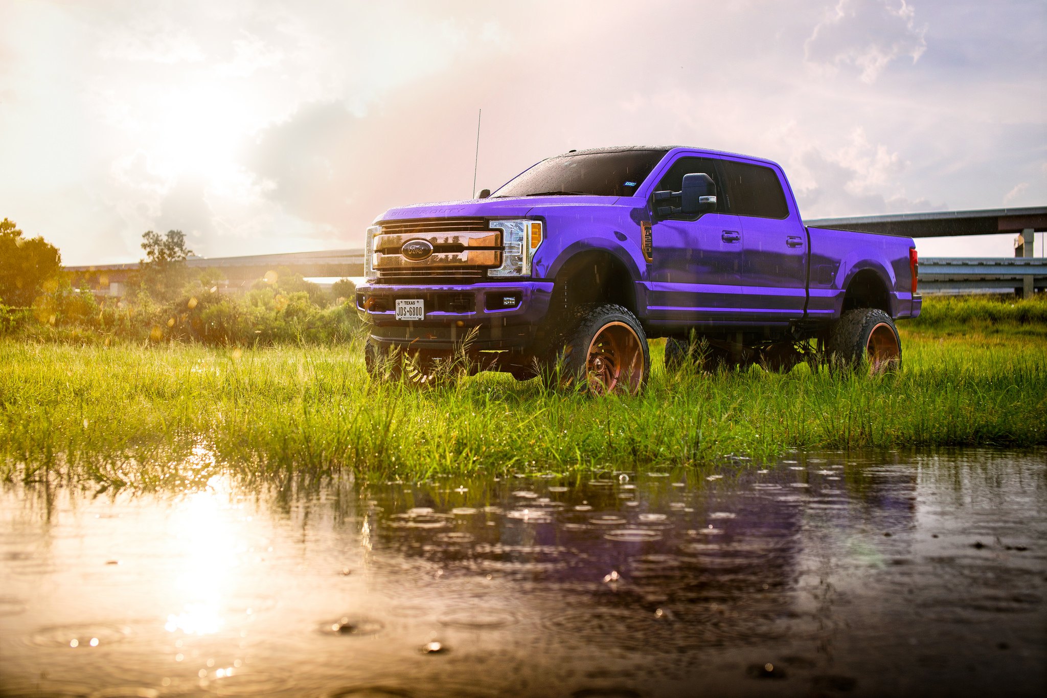 Purple Ford F-250 Super Duty with Custom Headlights - Photo by Fuel Offroad
