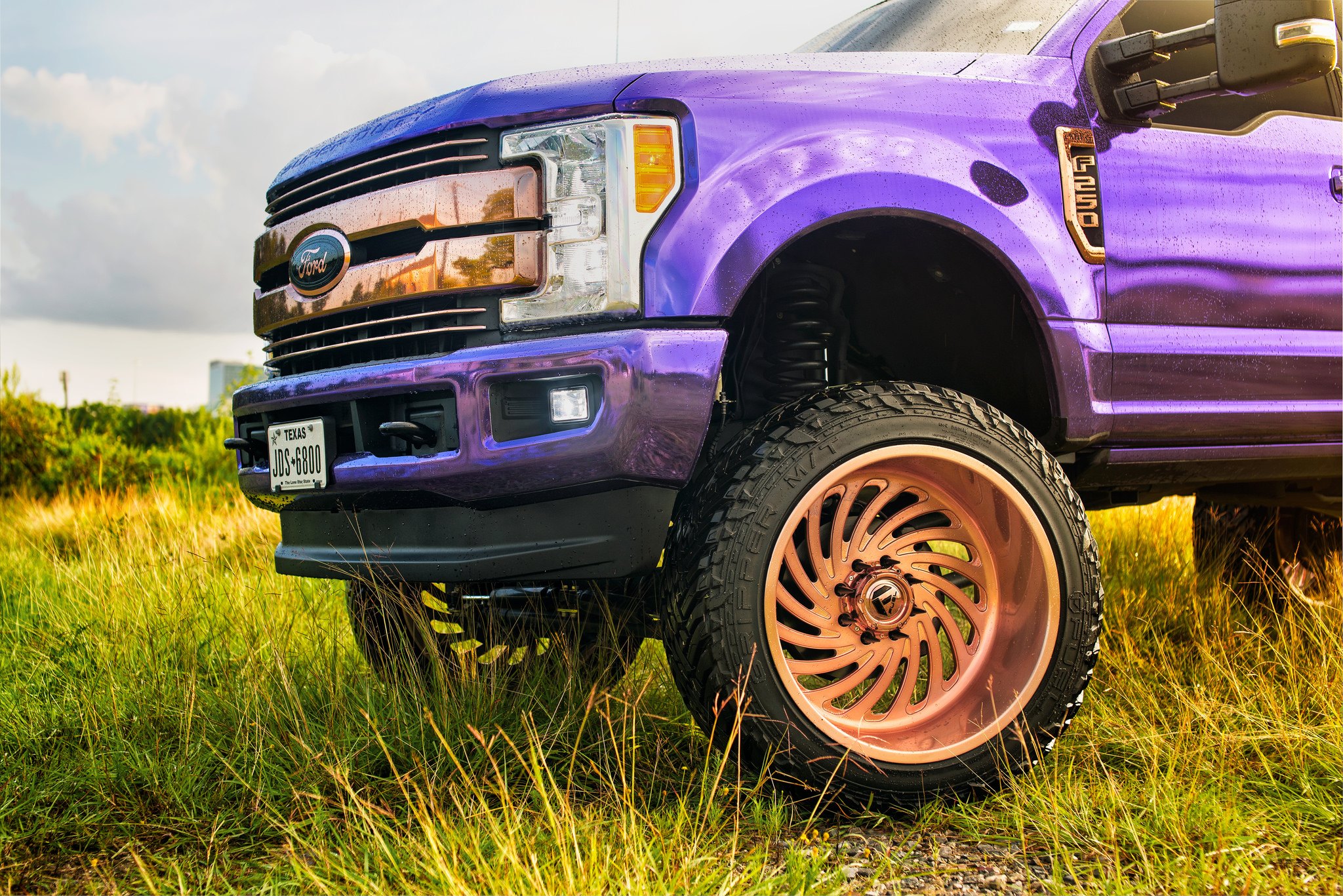 Fuel Offroad Gripper Tires on Purple Ford F-250 - Photo by Fuel Offroad