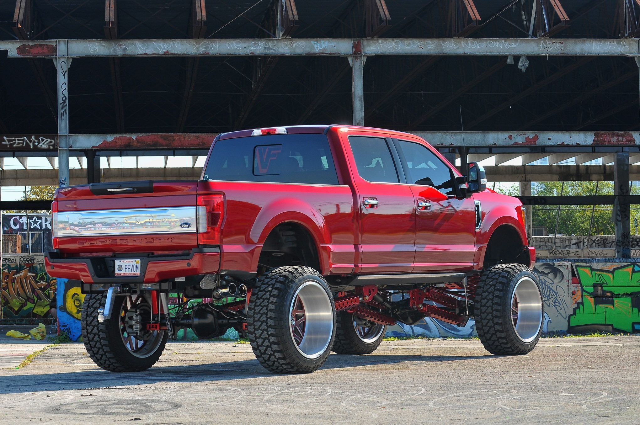 Custom Suspension System on Red Lifted Ford F-250 - Photo by Phil Gordon