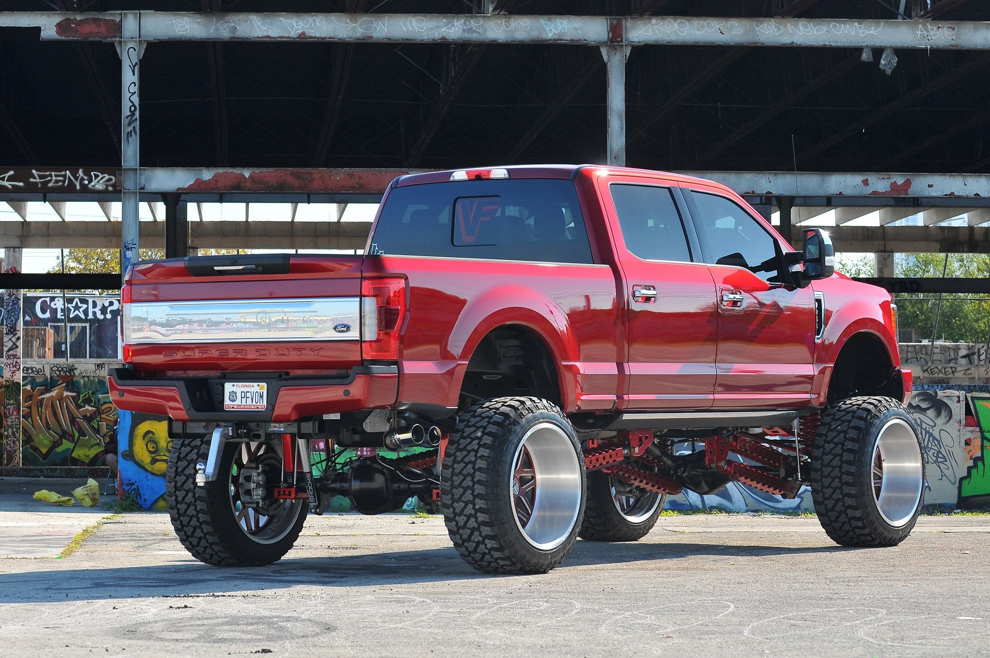 Aftermarket Rear Bumper on Red Lifted Ford F-250 - Photo by Phil Gordon