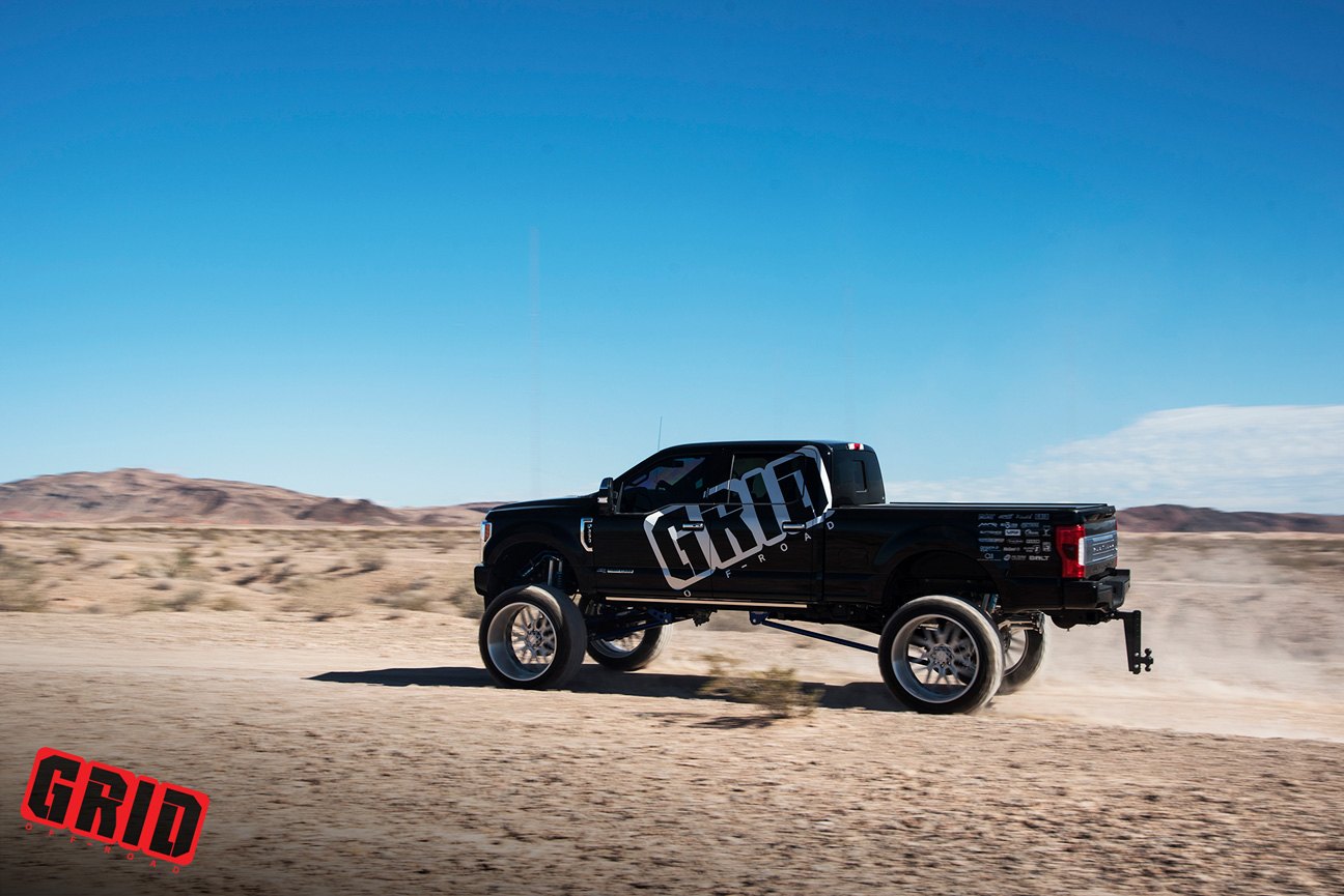 Off-Road Rear Bumper on Black Lifted Ford F-250 - Photo by Grid Off-Road