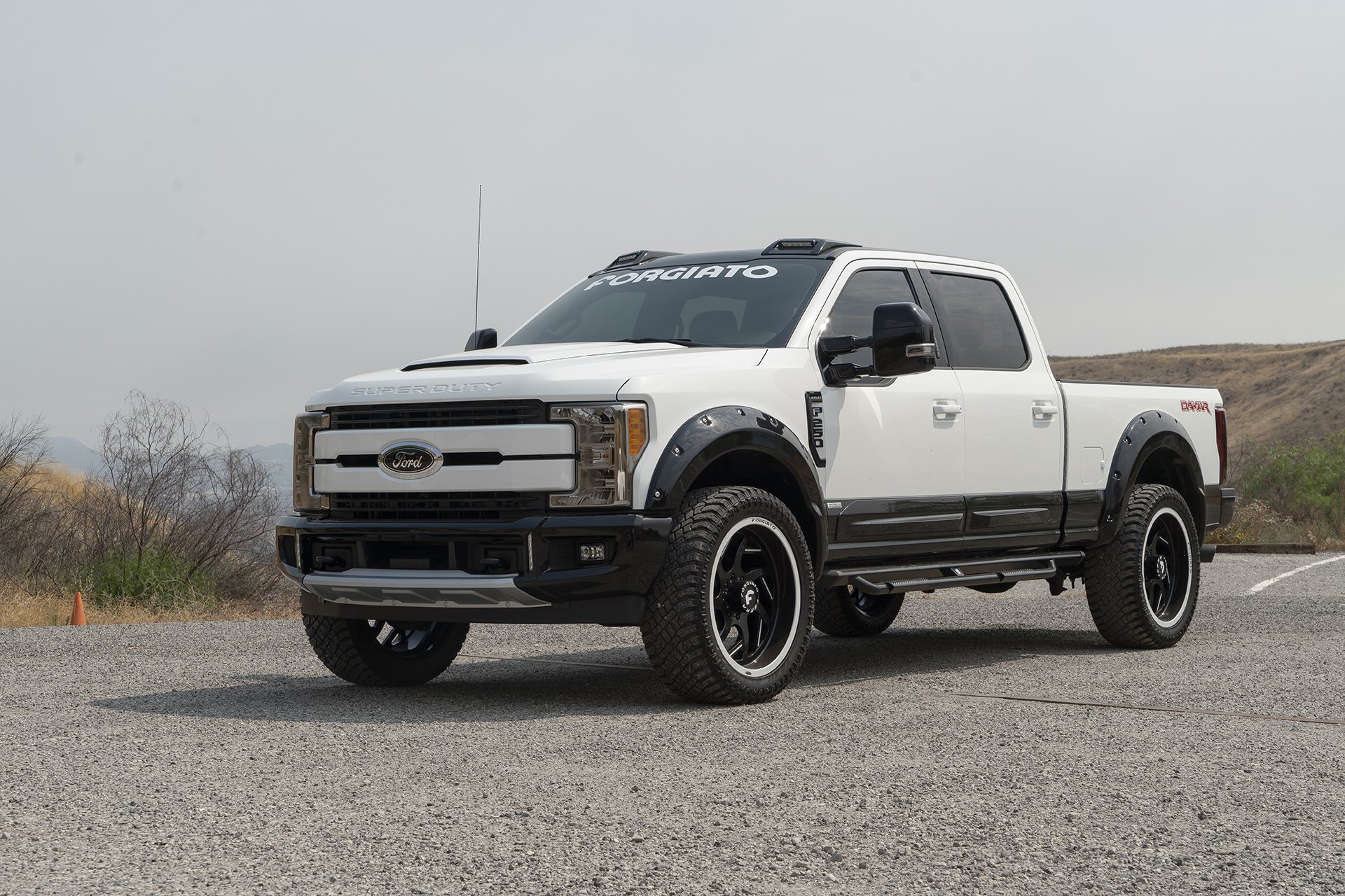 White Ford F-250 Super Duty with Aftermarket Front Bumper - Photo by Forgiato