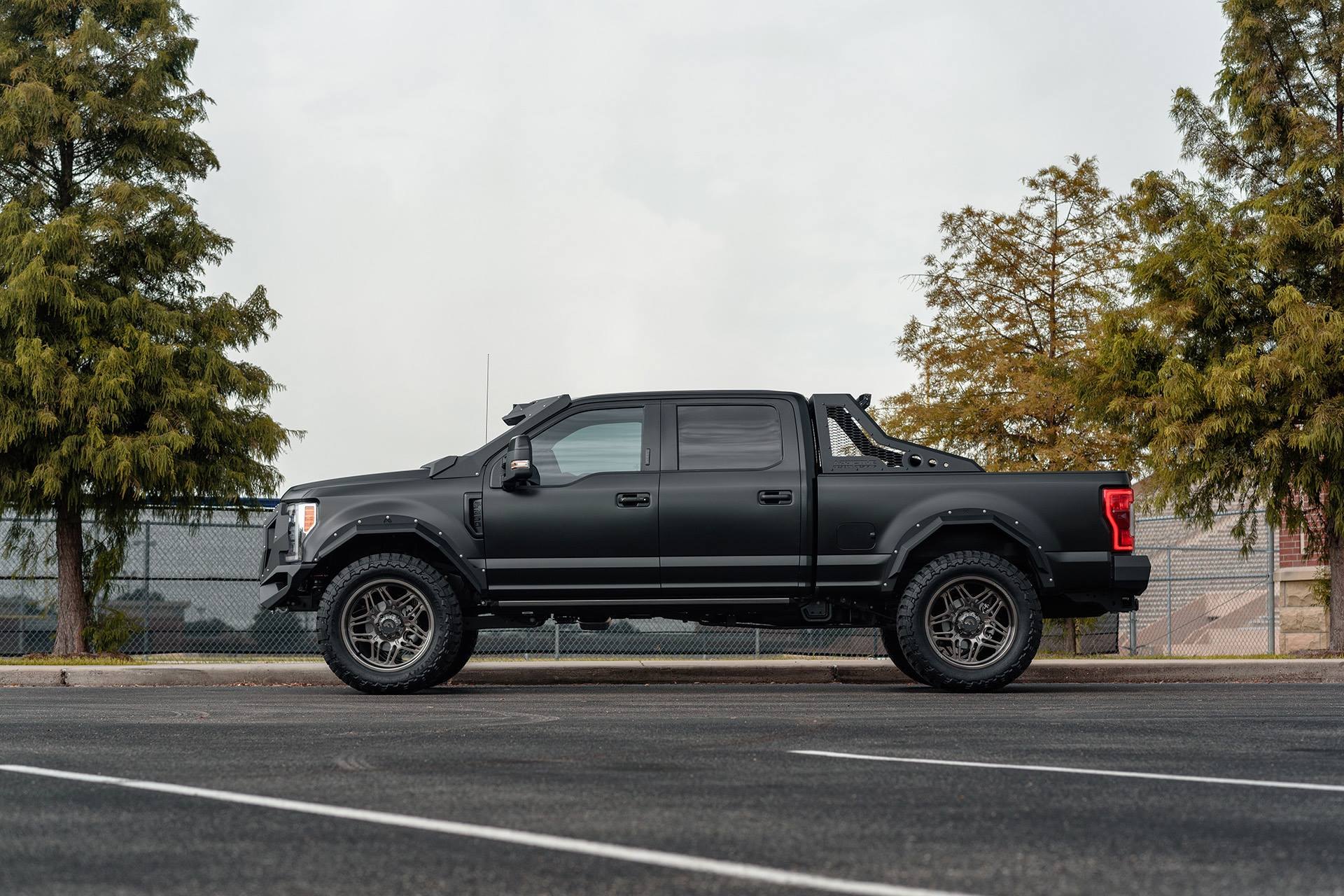 Matte Black Ford F-250 with Aftermarket Fender Flares - Photo by Forgiato