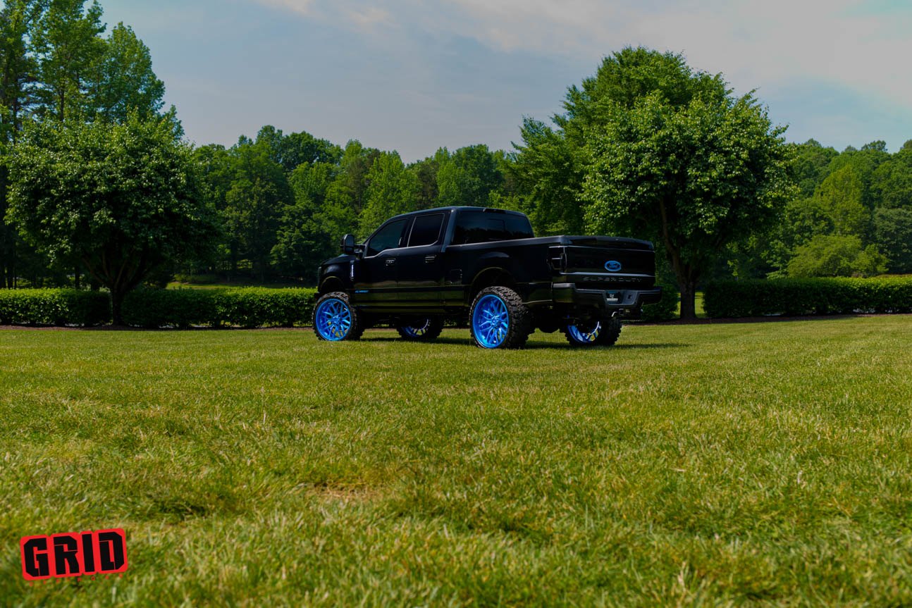 Dark Smoke LED Taillights on Black Lifted Ford F-250 - Photo by Grid Off-Road