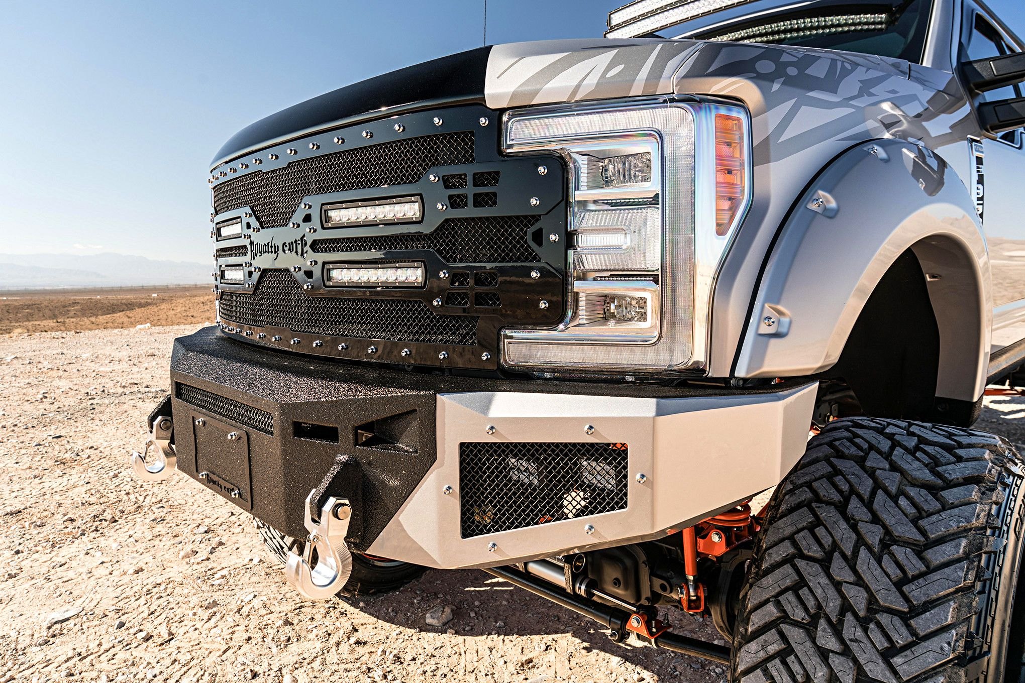 Custom Projector Headlights on White Lifted Ford F-350 - Photo by Dale Martin