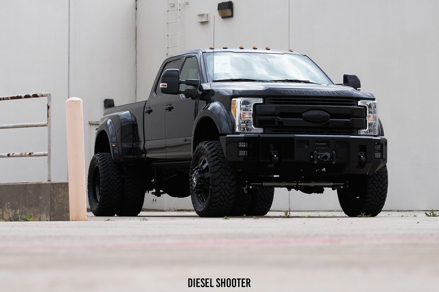 Blacked Out Ford F-450 on Custom American Force Wheels - Photo by Diesel Shooter